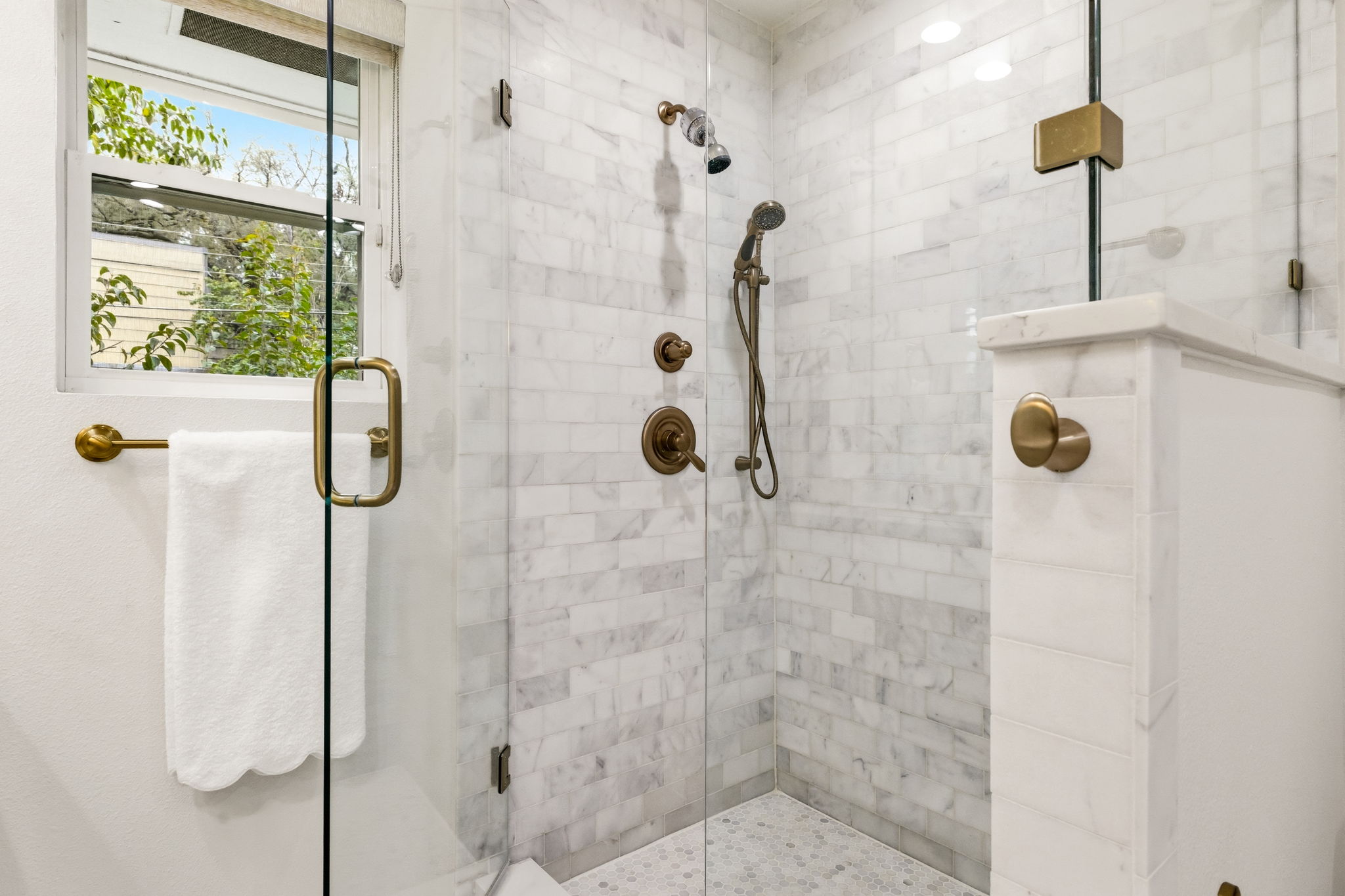 5765 Stonegate Road Dallas, TX 75209 - Photo 24 of 37 a bathroom with a shower