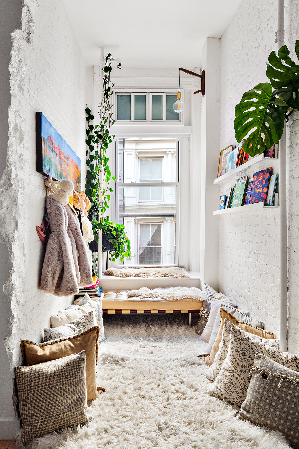 75 Grand Street, Unit 3E Manhattan, NY 10013 - Photo 11 of 20 a living room with furniture and a potted plant