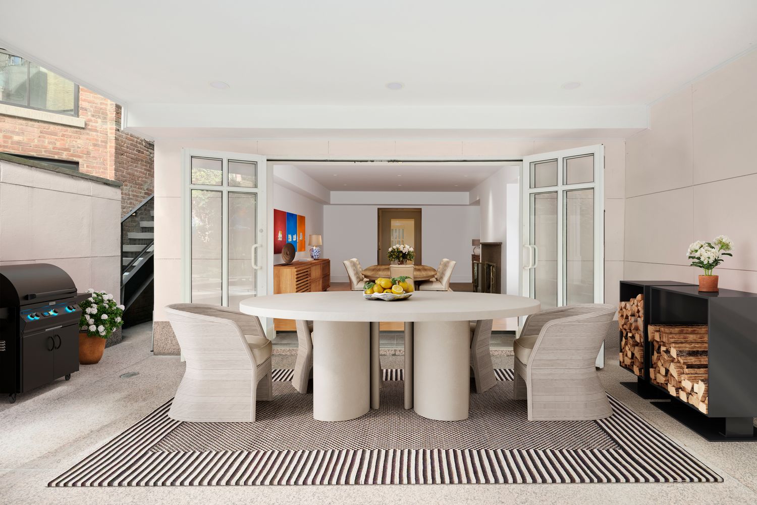 a front view of a house with a yard and fountain