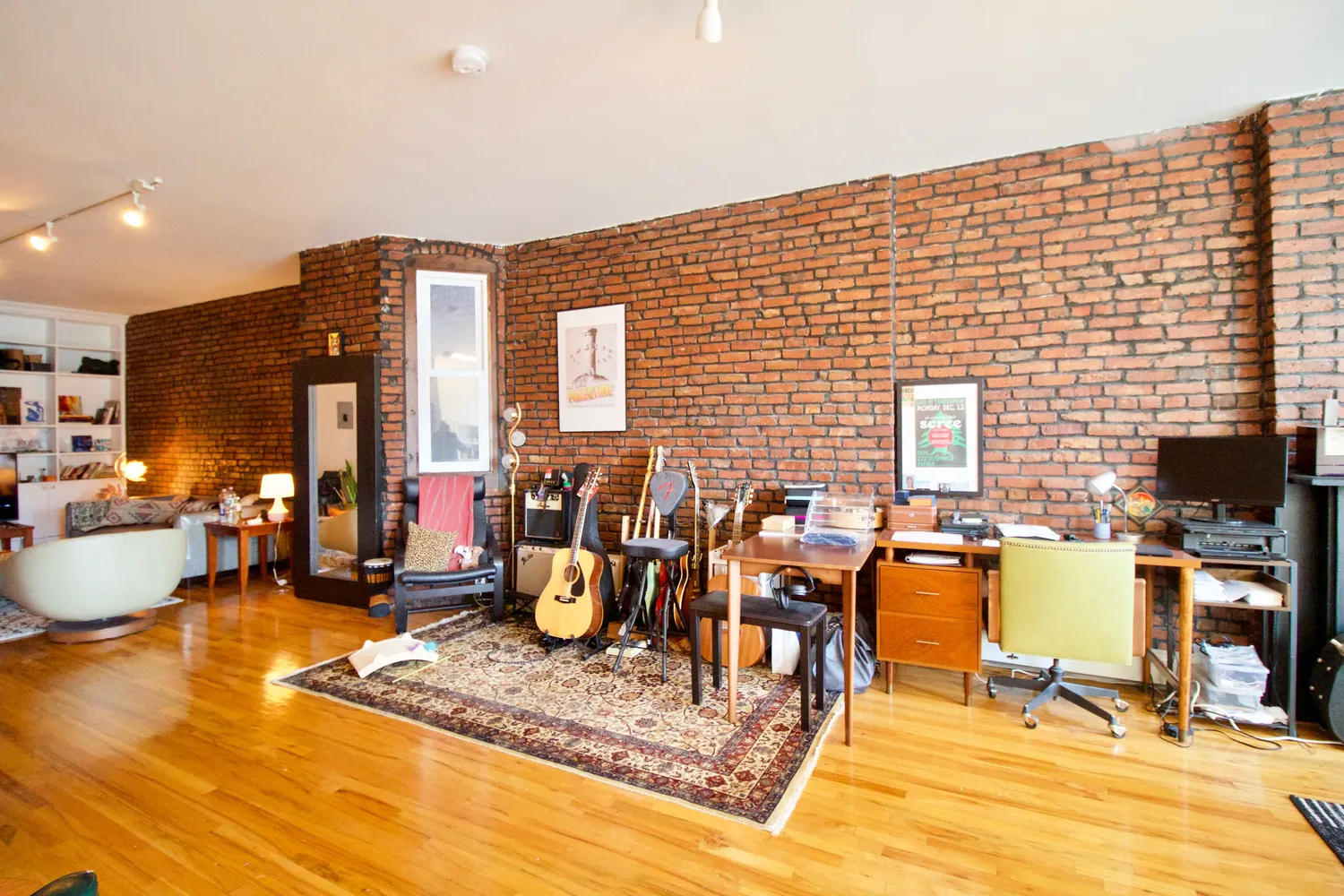 a view of a dining room with furniture