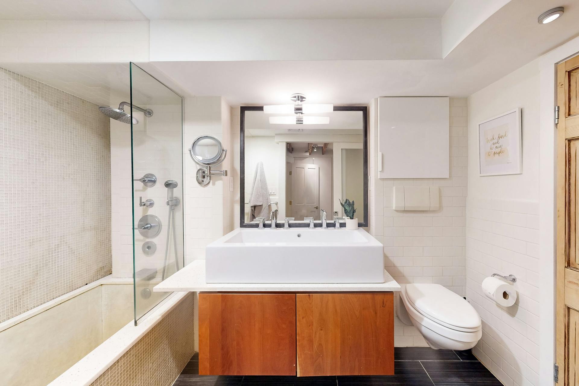 11 Fayette Street, Unit 1 Boston, MA 02116 - Photo 21 of 33 a bathroom with a sink a toilet and shower