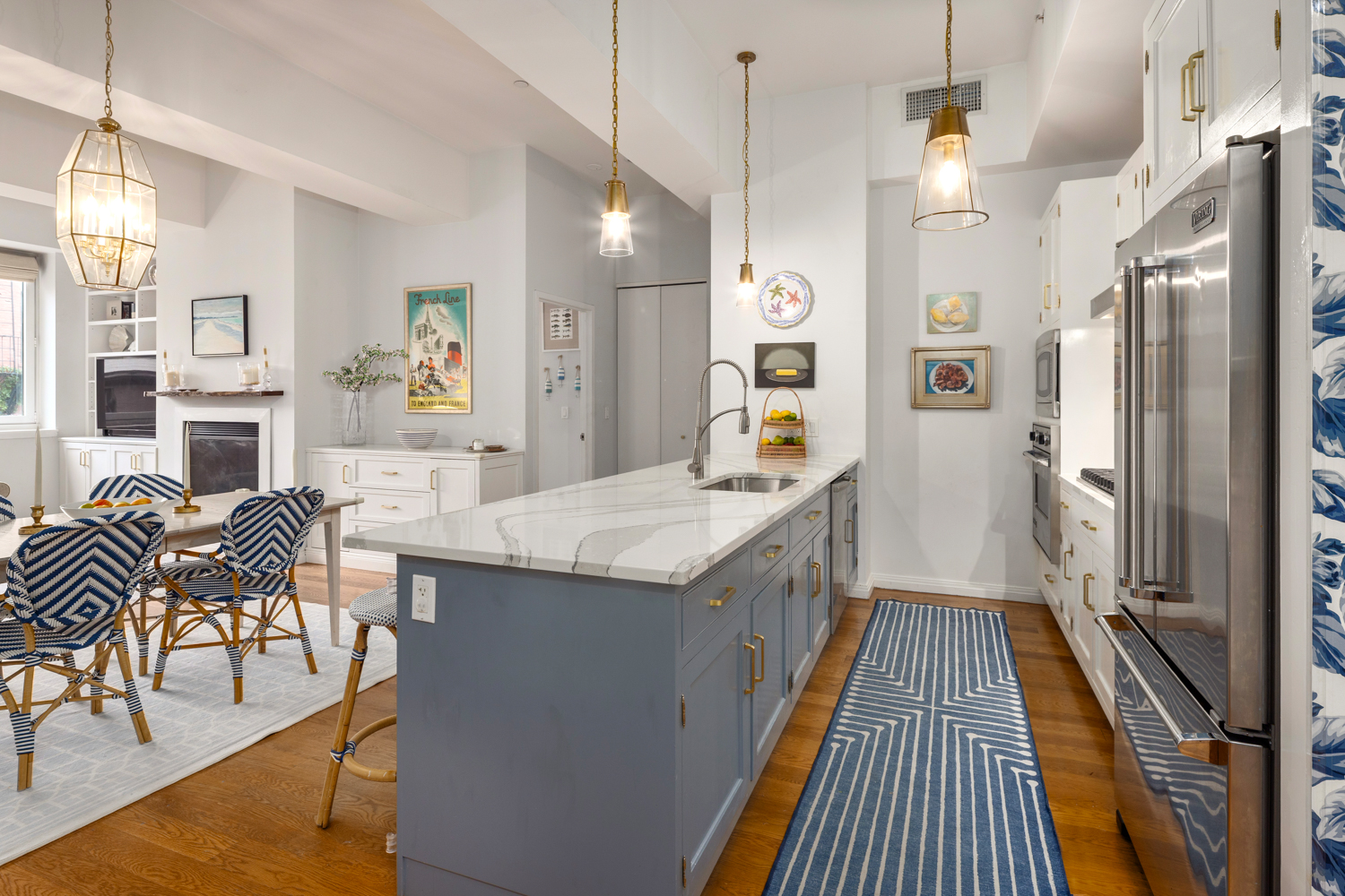 9 College Place, Unit 3A Brooklyn, NY 11201 - Photo 4 of 13 a kitchen with granite countertop a stove a sink a refrigerator and a dining table