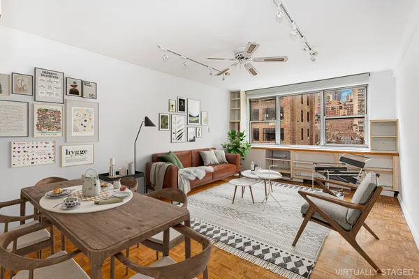 a living room with furniture and a table