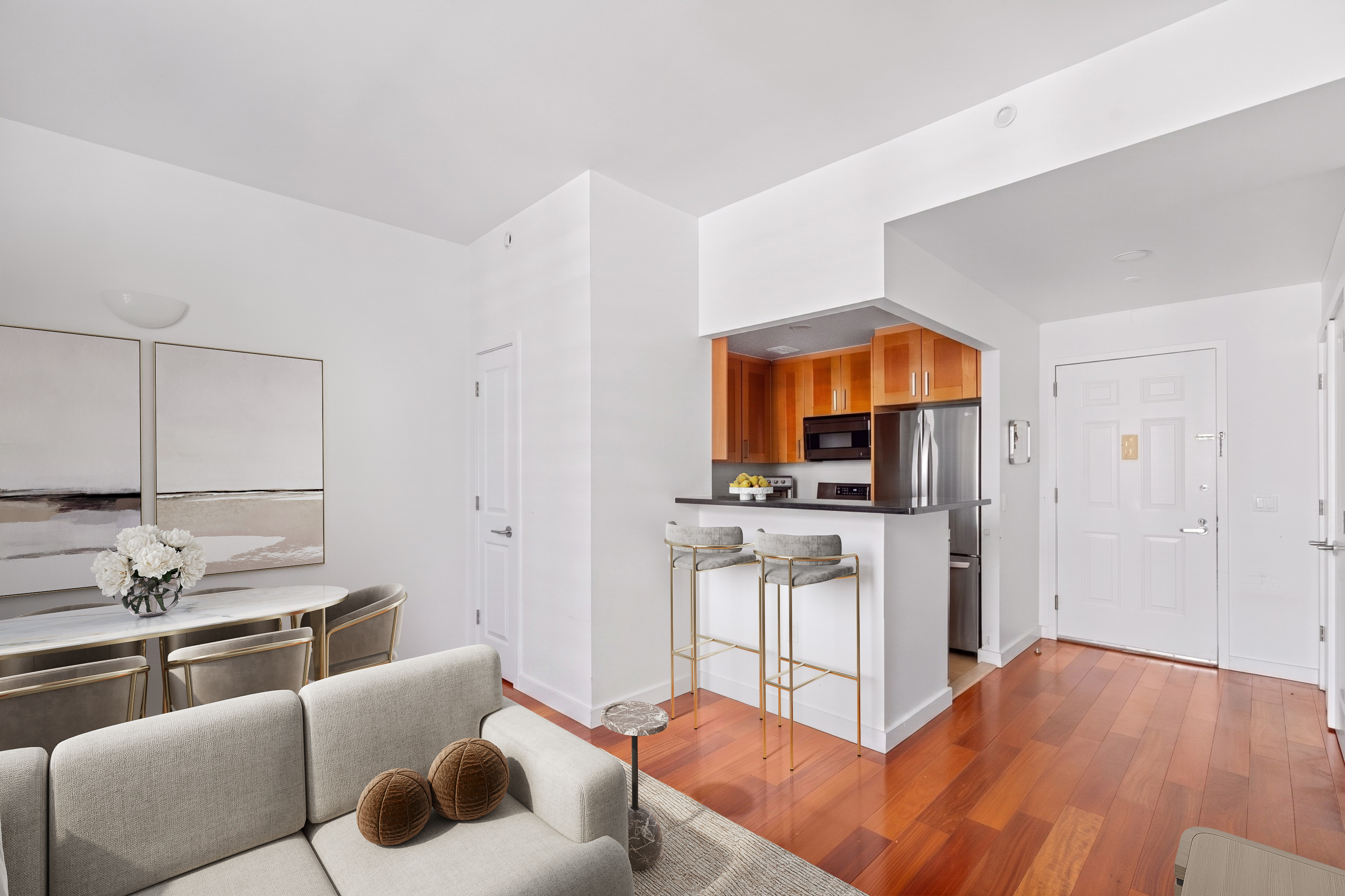 313 West 119th Street, Unit 4E Manhattan, NY 10027 - Photo 2 of 14 a living room with furniture and a flat screen tv
