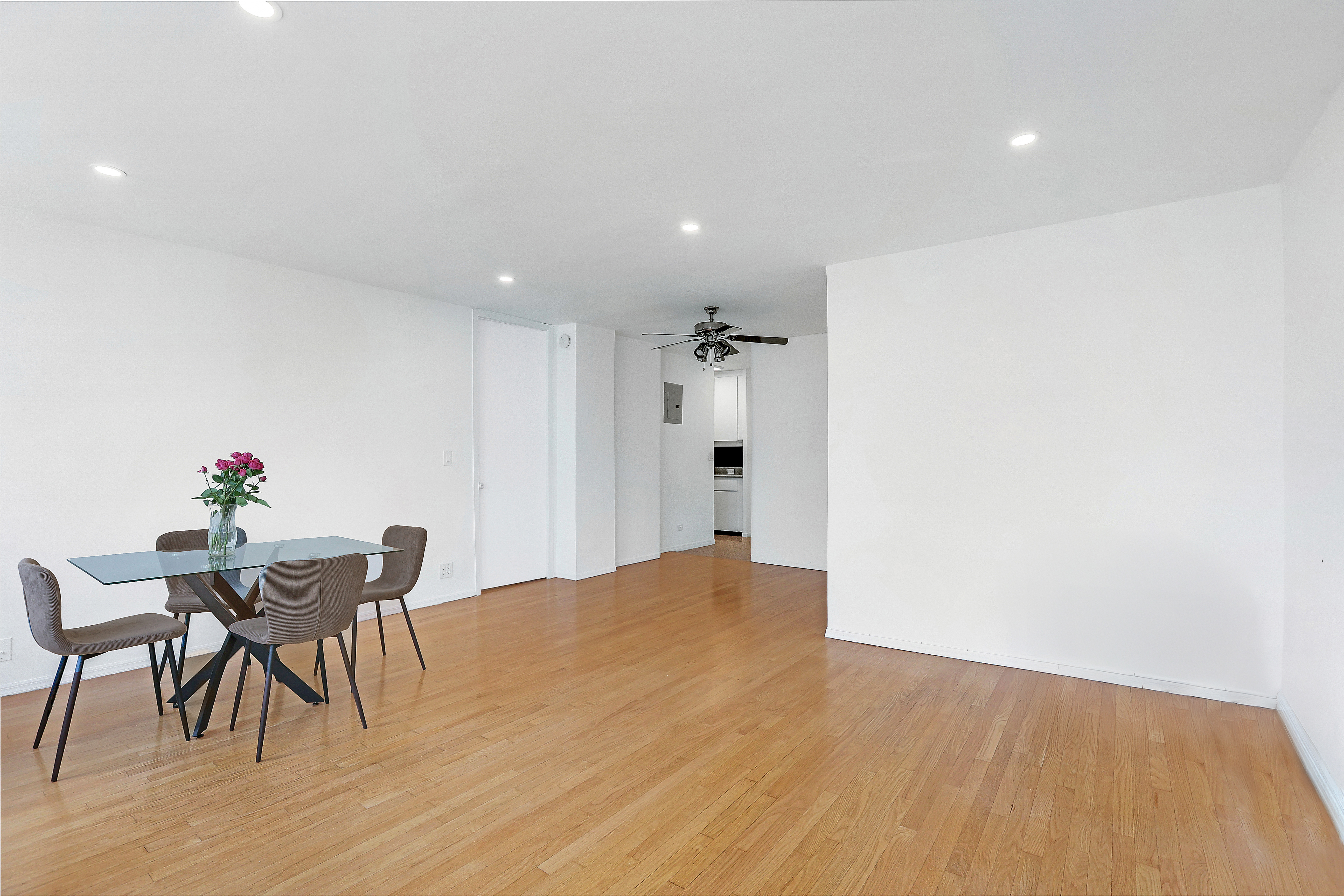 300 East 33rd Street, Unit 21K Manhattan, NY 10016 - Photo 6 of 17 a view of a dining room with furniture and wooden floor