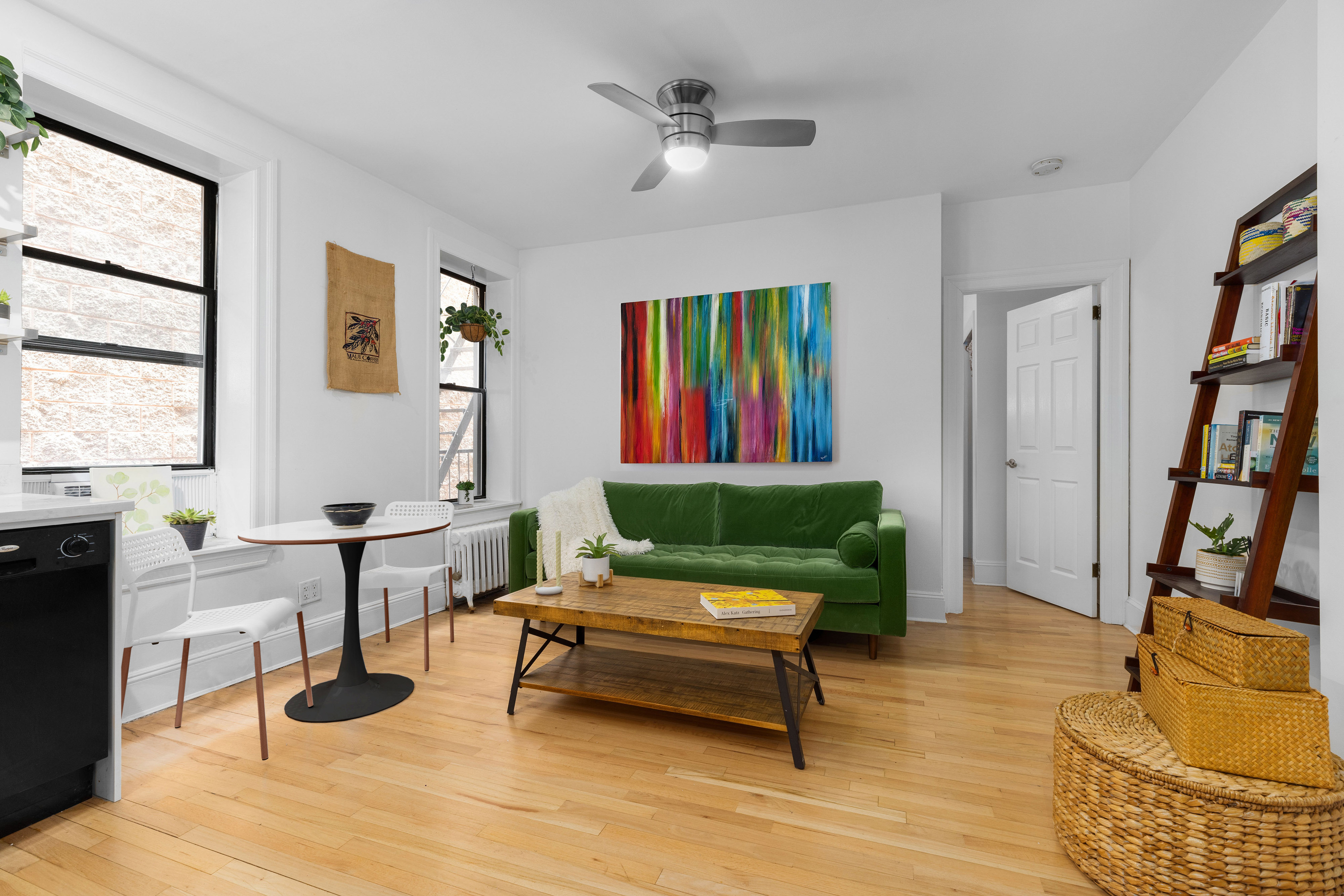 251 Pacific Street, Unit 8 Brooklyn, NY 11201 - Photo 2 of 9 a living room with furniture and a book shelf