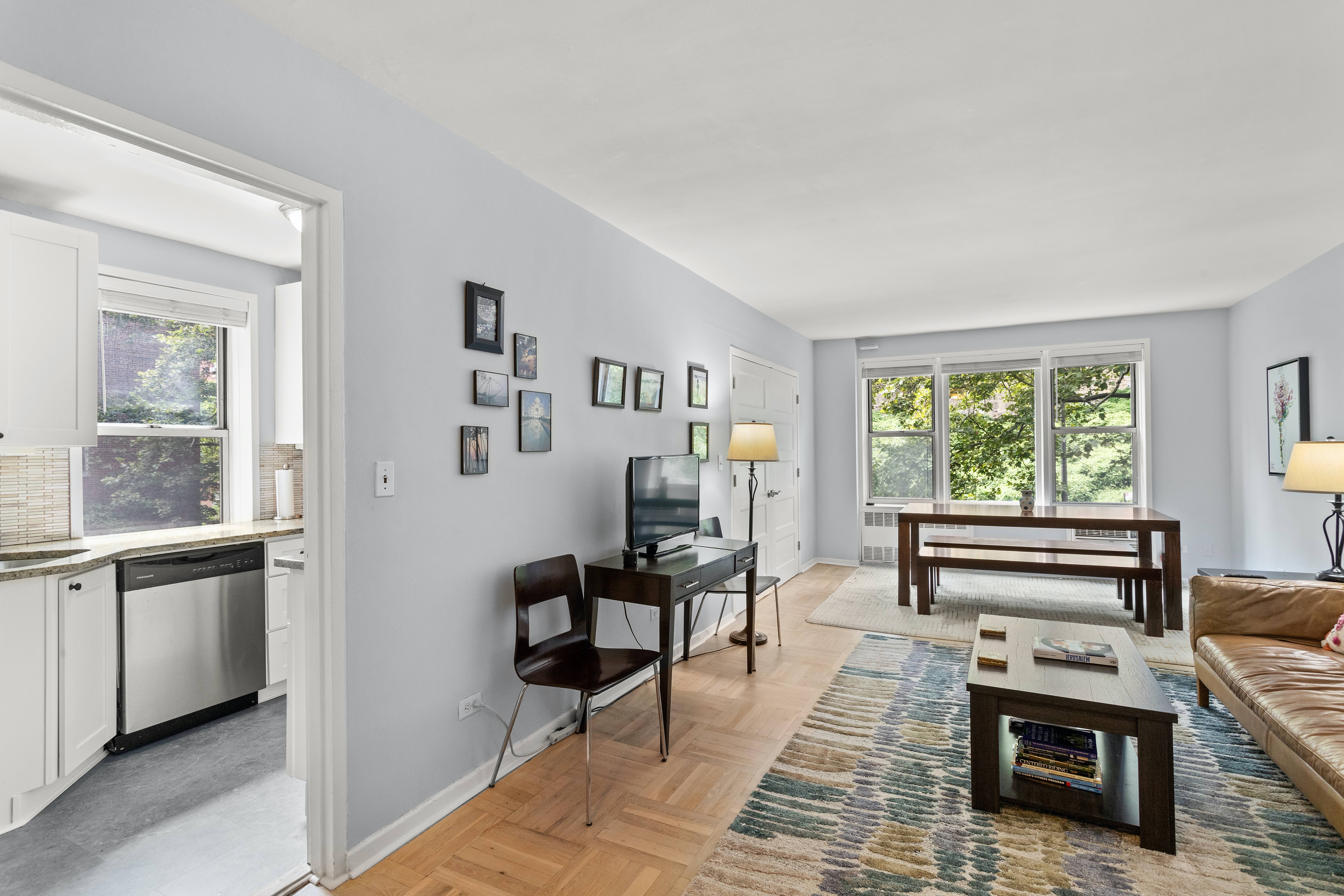 66 Overlook Terrace, Unit 4K Manhattan, NY 10040 - Photo 2 of 26 a bedroom with furniture and a window