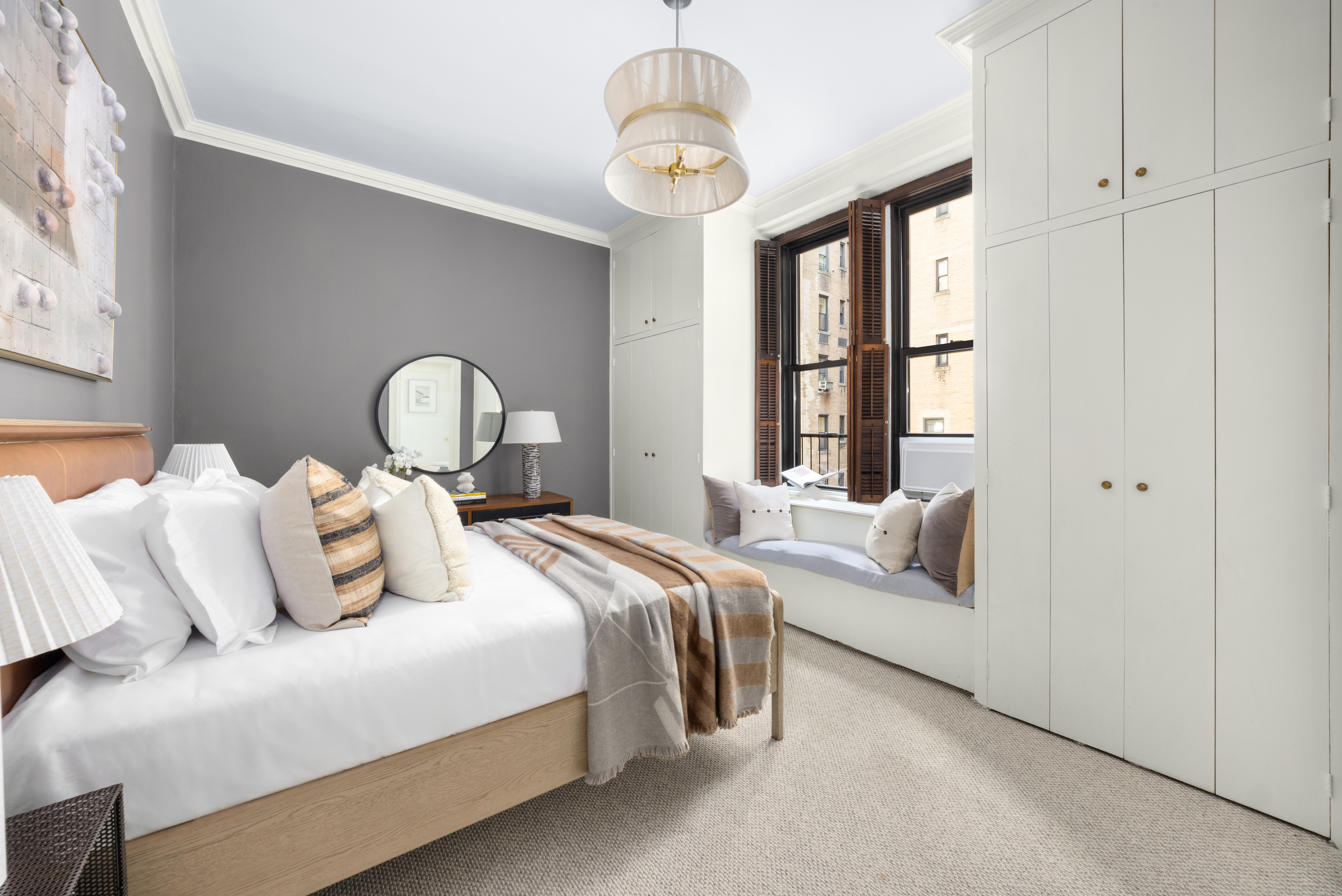 993 Park Avenue, Unit 4C Manhattan, NY 10028 - Photo 8 of 15 a bedroom with bed and a window