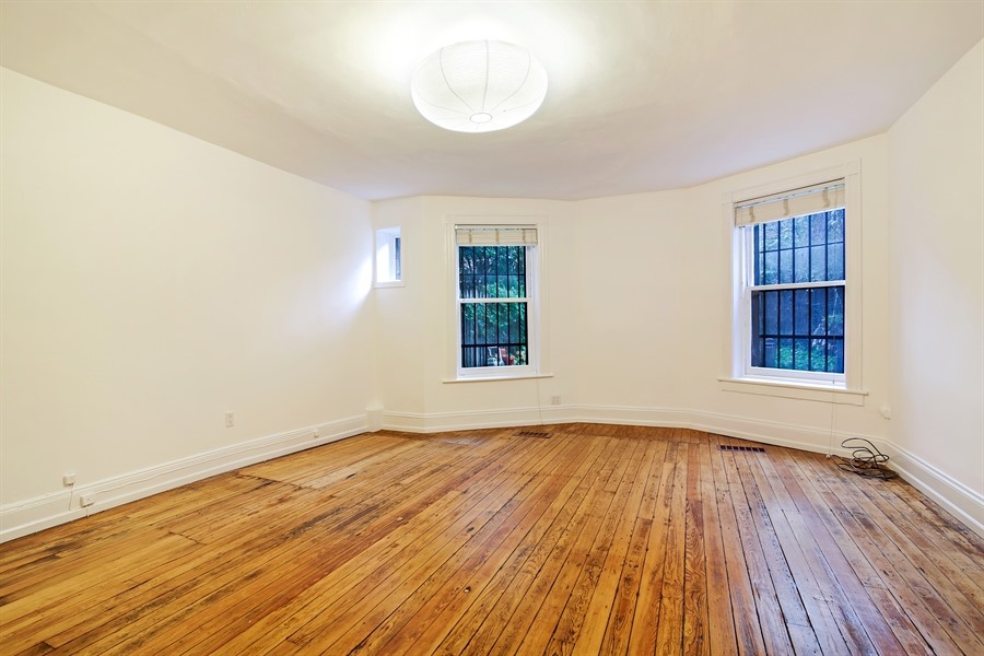 553 2nd Street, Unit 1 Brooklyn, NY 11215 - Photo 6 of 11 a view of empty room with wooden floor and fan