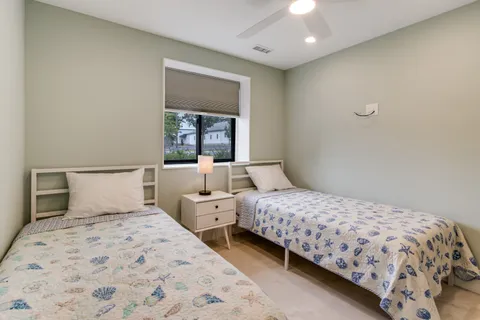 a view of storage and utility room with washer and dryer