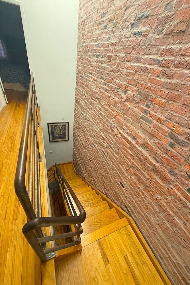 449 1/2 Hudson Street Manhattan, NY 10014 - Photo 7 of 19 a view of a swimming pool with seating area