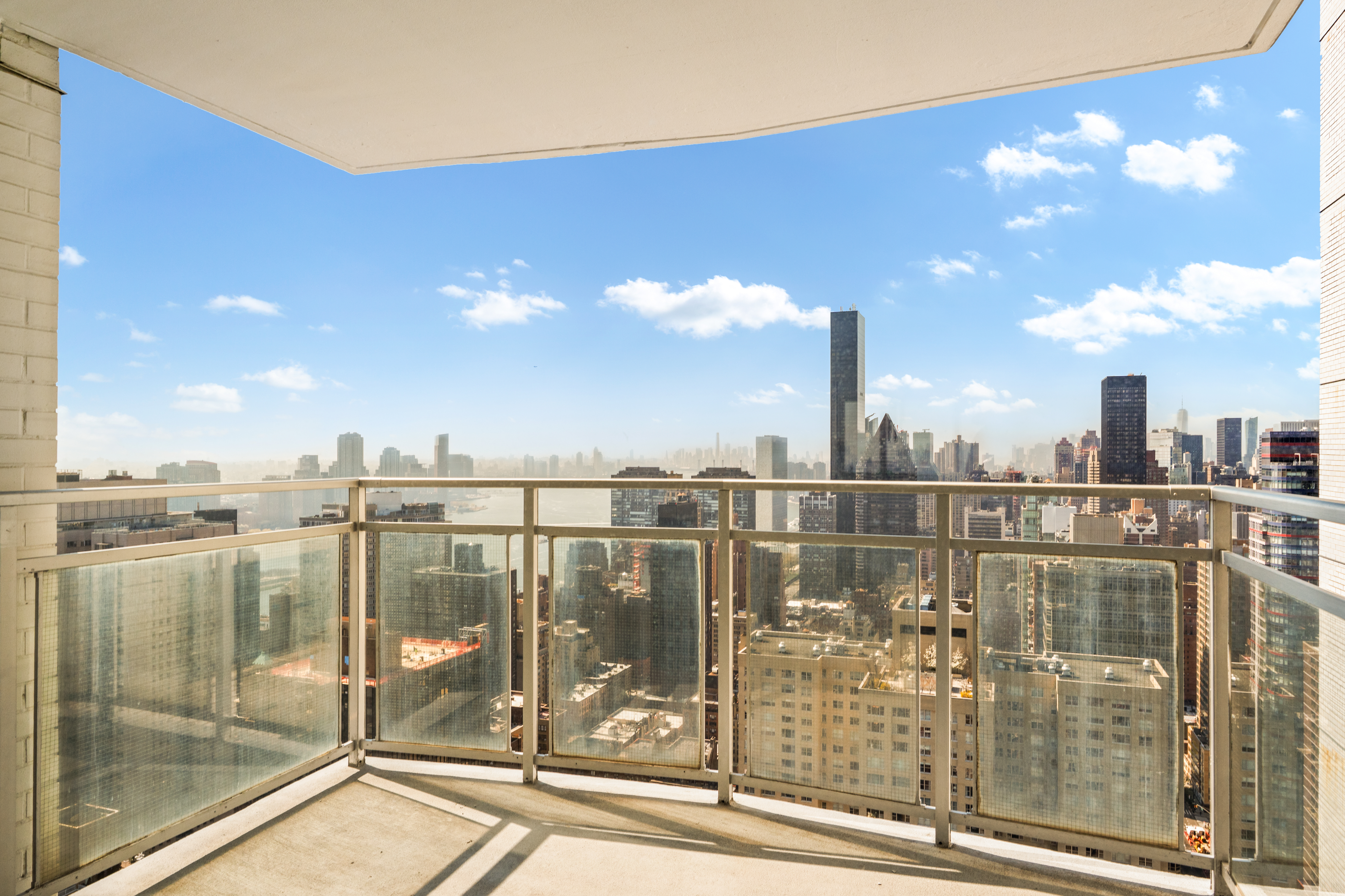 303 East 57th Street, Unit 44G Manhattan, NY 10022 - Photo 2 of 19 a view of a city from a balcony
