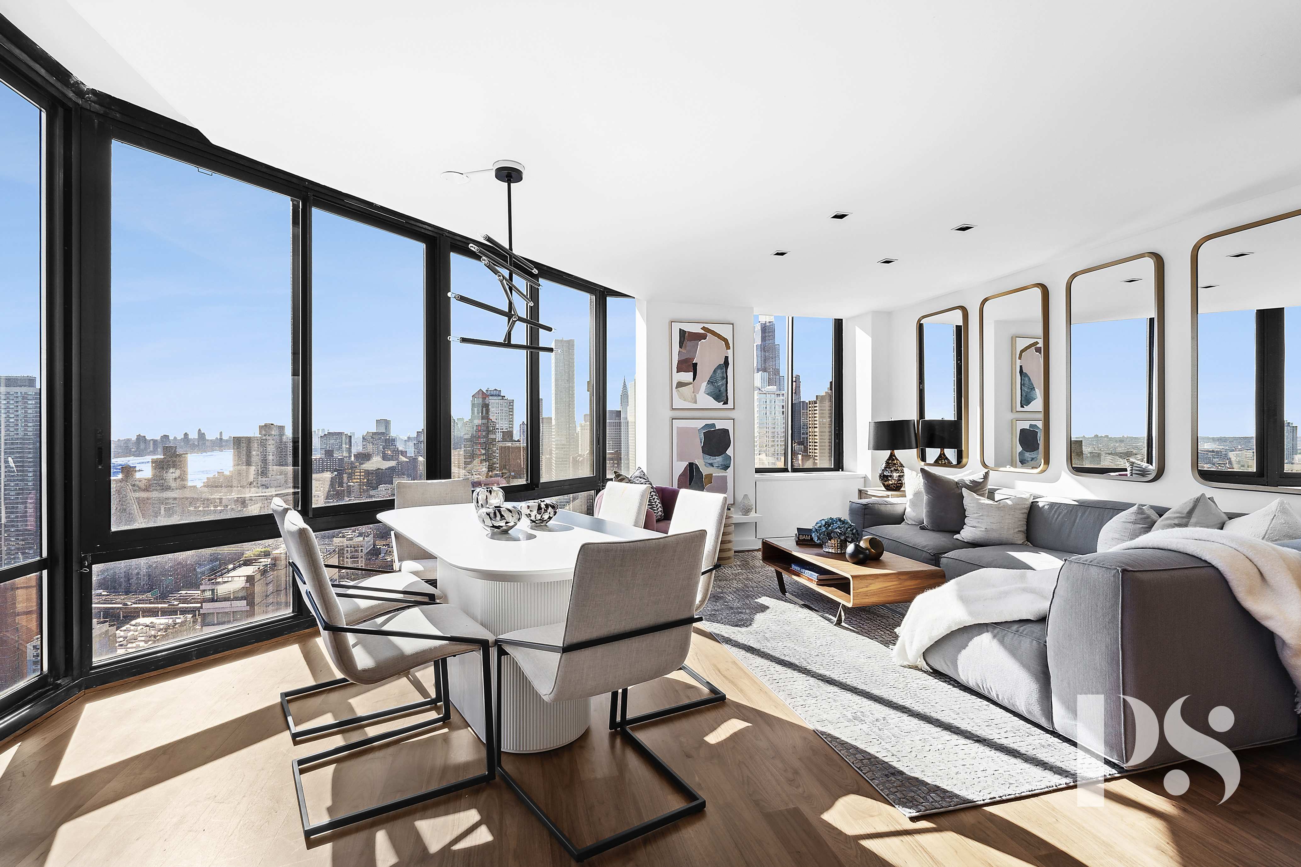 304 East 65th Street, Unit 39C Manhattan, NY 10065 - Photo 1 of 10 a living room with furniture and large windows