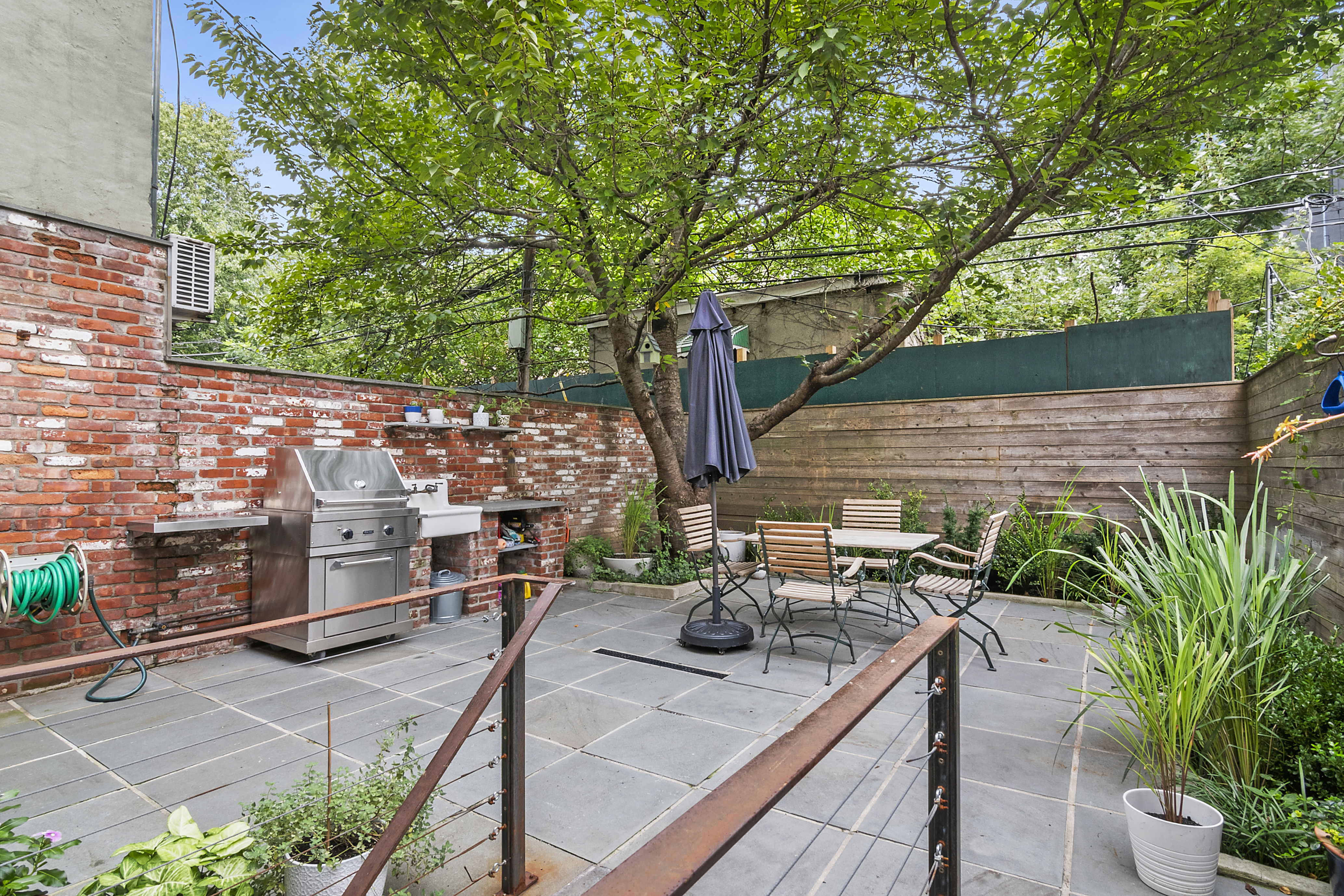 87 Monroe Street Brooklyn, NY 11216 - Photo 21 of 26 a view of deck with patio