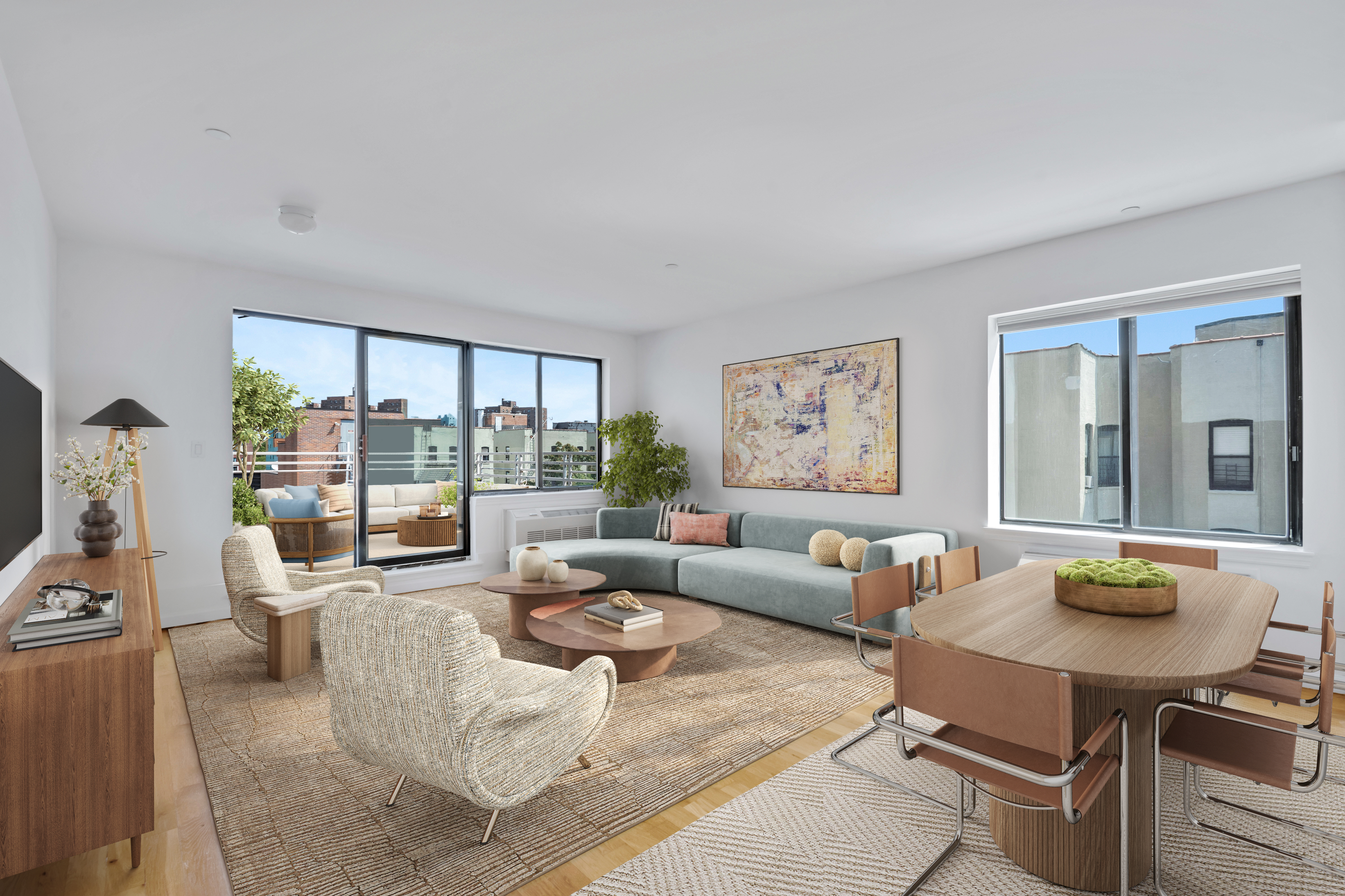 416 East 117th Street, Unit PH6 Manhattan, NY 10035 - Photo 3 of 18 a living room with furniture and a large window