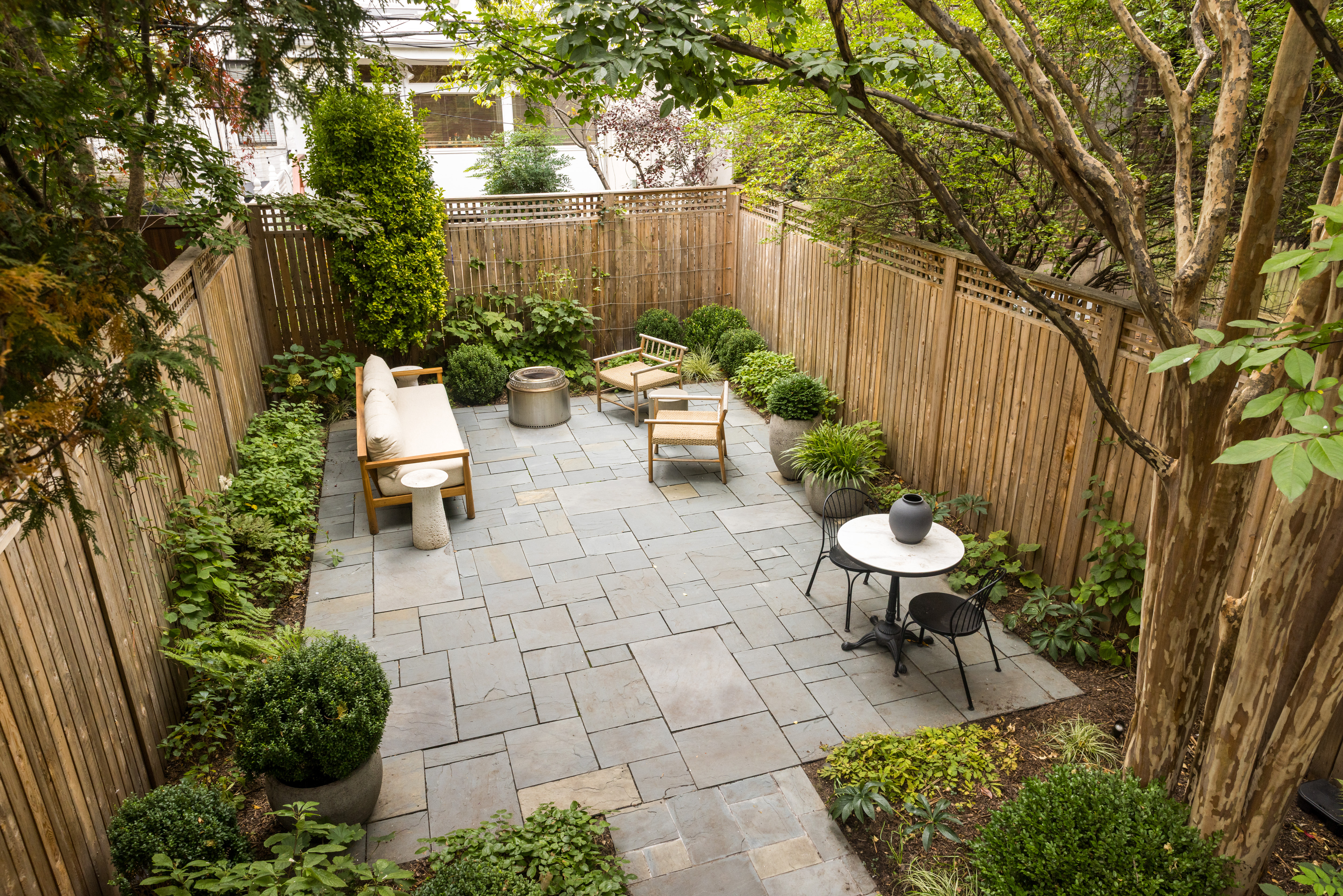 309 Pacific Street Brooklyn, NY 11201 - Photo 18 of 22 a view of a chairs and table in backyard