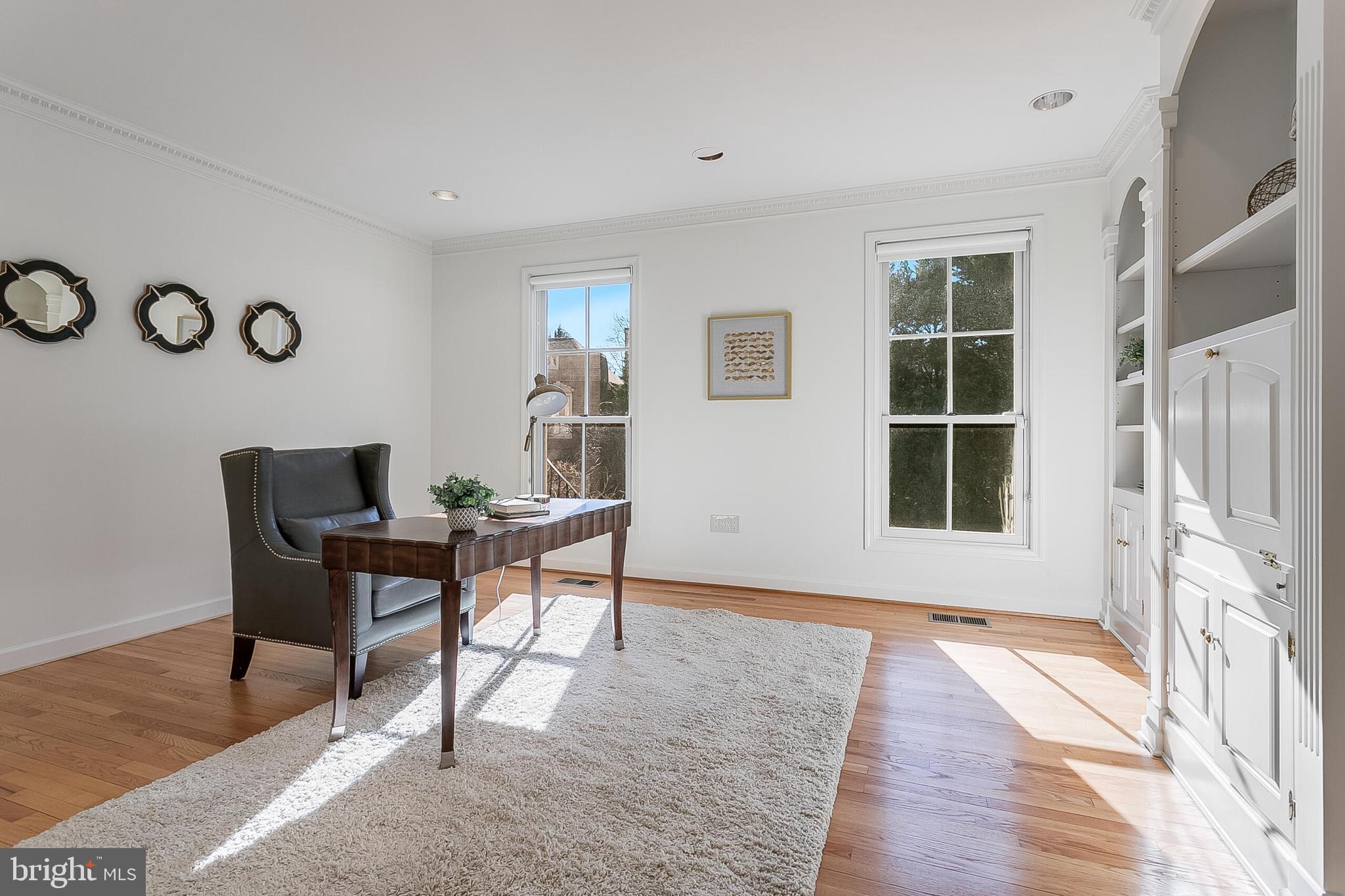 4709 Foxhall Crescent Northwest Washington, DC 20007 - Photo 21 of 57 a workspace with furniture and a window
