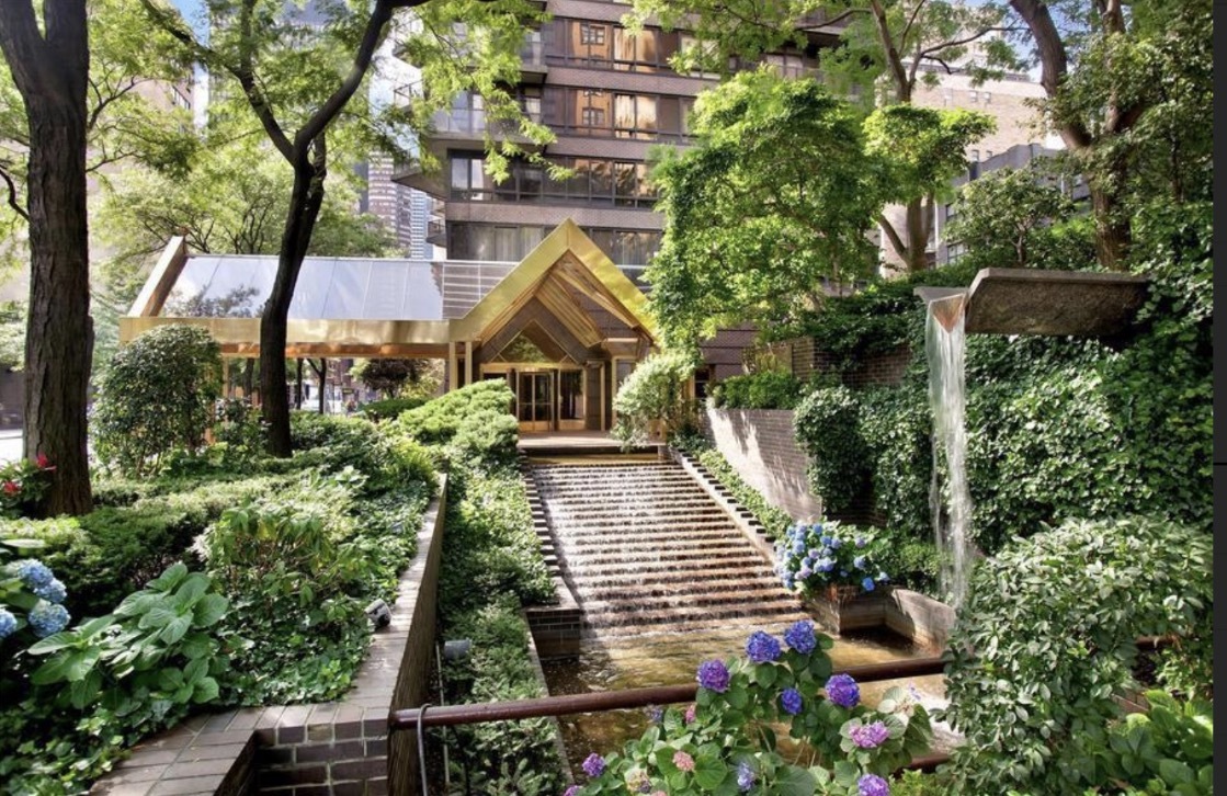 100 United Nations Plaza, Unit 8A Manhattan, NY 10017 - Photo 11 of 12 a view of a house with a yard