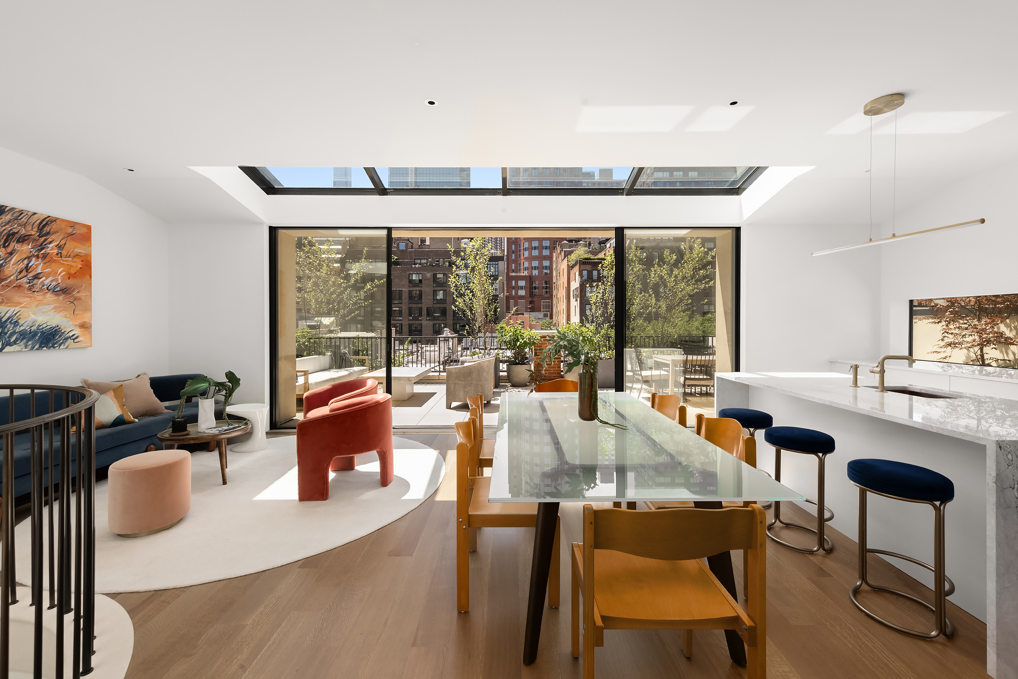 48-50 West 69th Street Manhattan, NY 10023 - Photo 22 of 33 a dining room with furniture water view and a floor to ceiling window