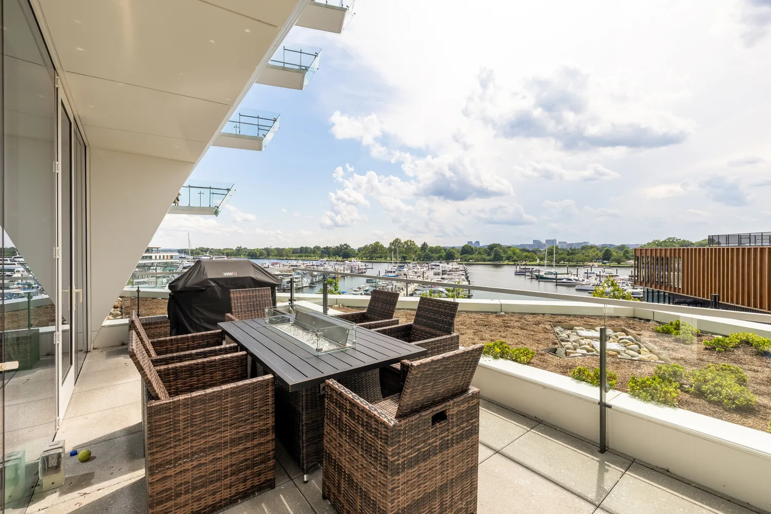 a large bedroom with a bed and glass door