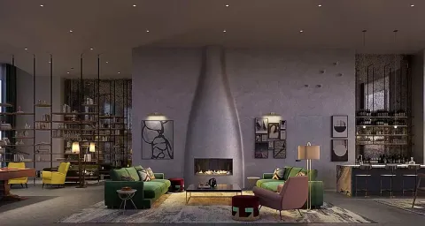 a living room with furniture a fireplace and kitchen view