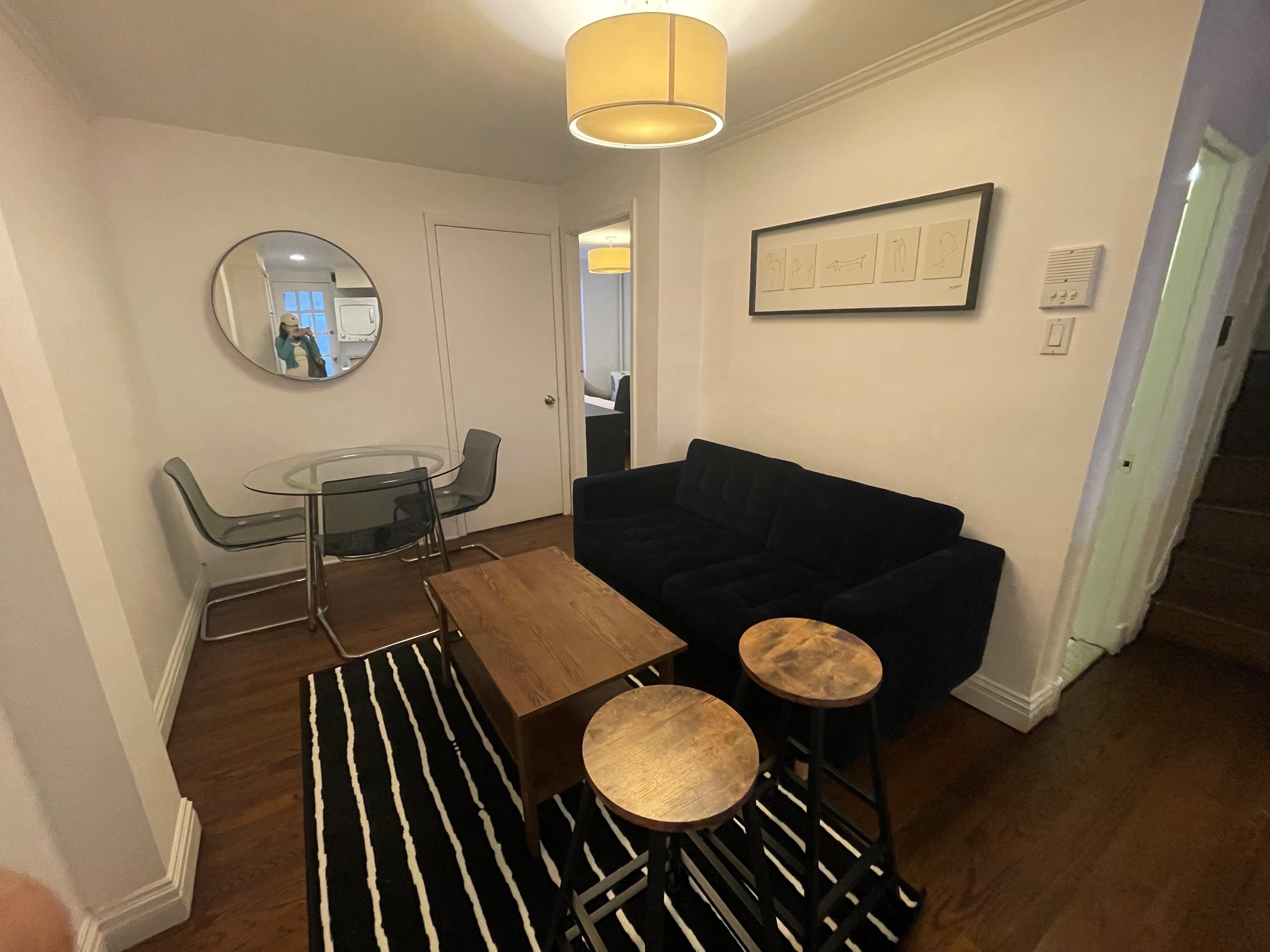120 East 10th Street, Unit 1 Manhattan, NY 10003 - Photo 13 of 24 a view of a dining room furniture and a chandelier