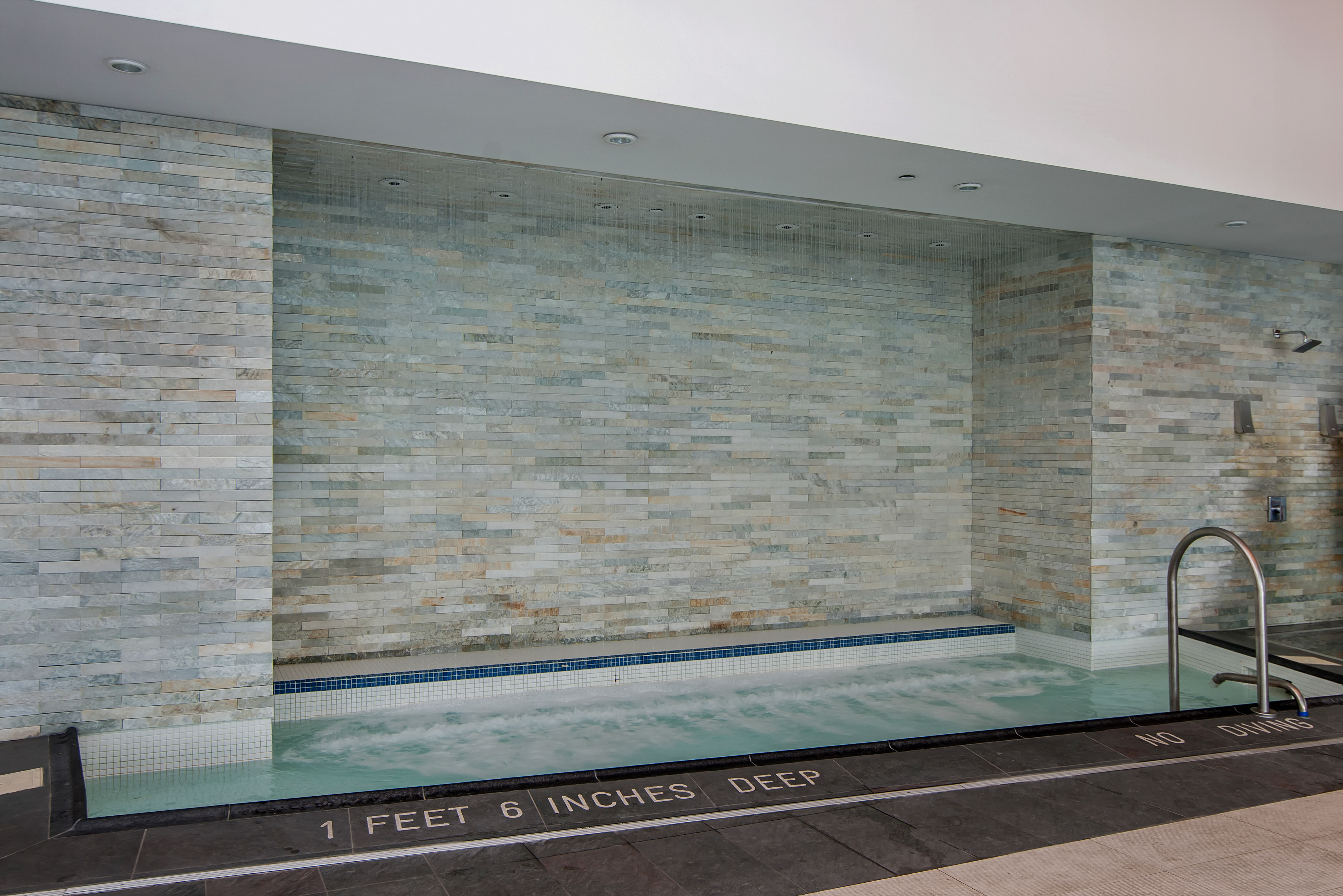 22 North 6th Street, Unit 18J Brooklyn, NY 11249 - Photo 10 of 18 a bathroom with a bathtub and shower