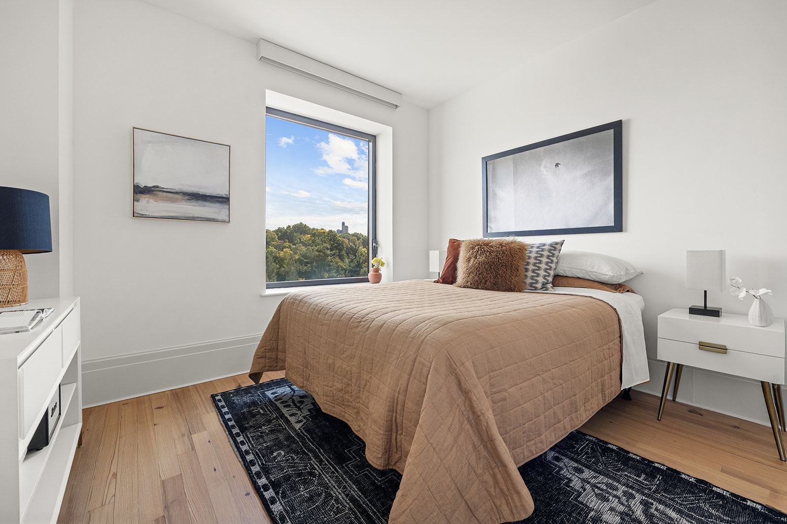 1 Prospect Park West, Unit 8C Brooklyn, NY 11215 - Photo 7 of 11 a bedroom with a bed and a window