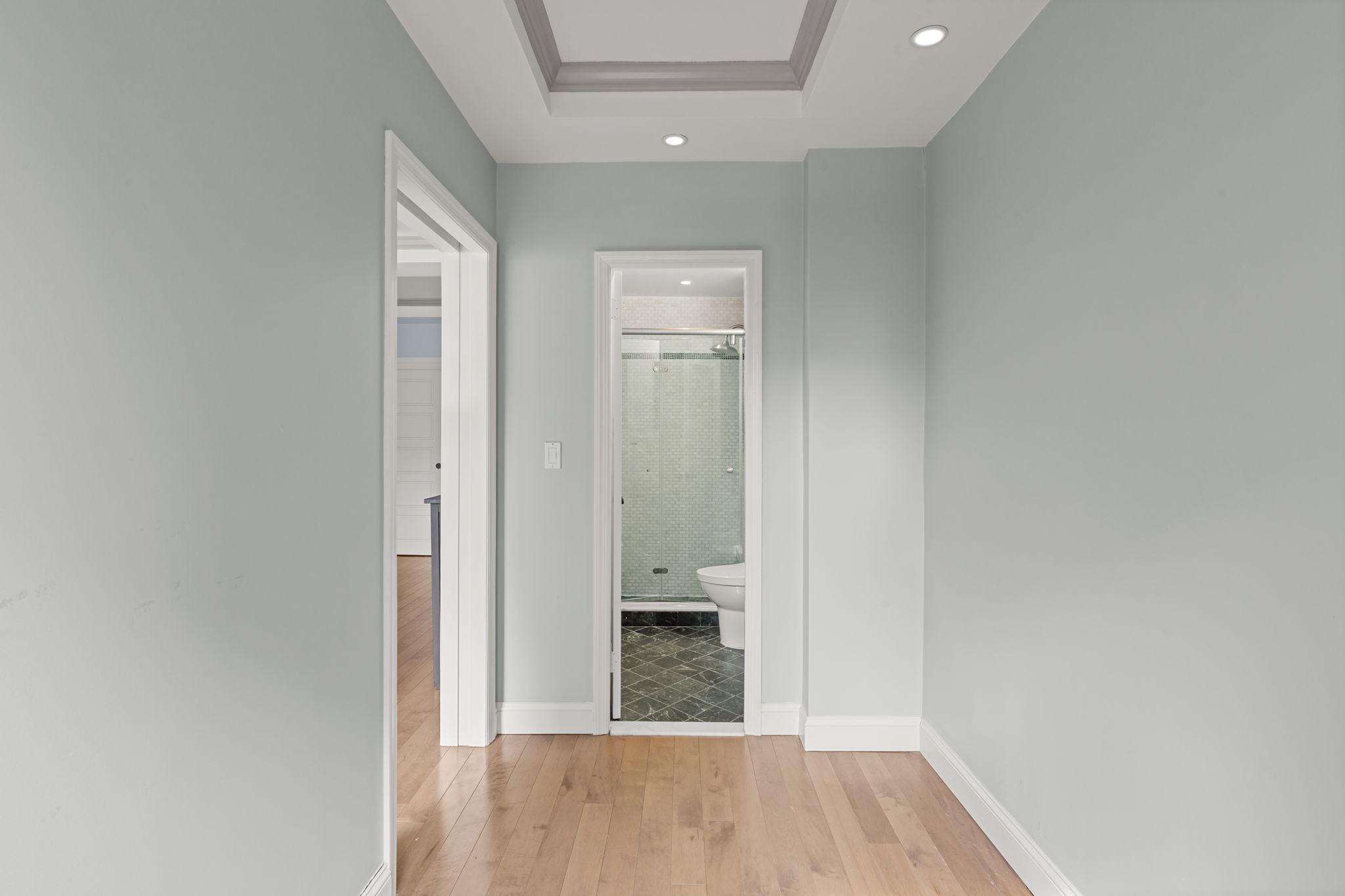 2 Tudor City Place, Unit 6JOS Manhattan, NY 10017 - Photo 10 of 16 wooden floor in a hall with an entryway