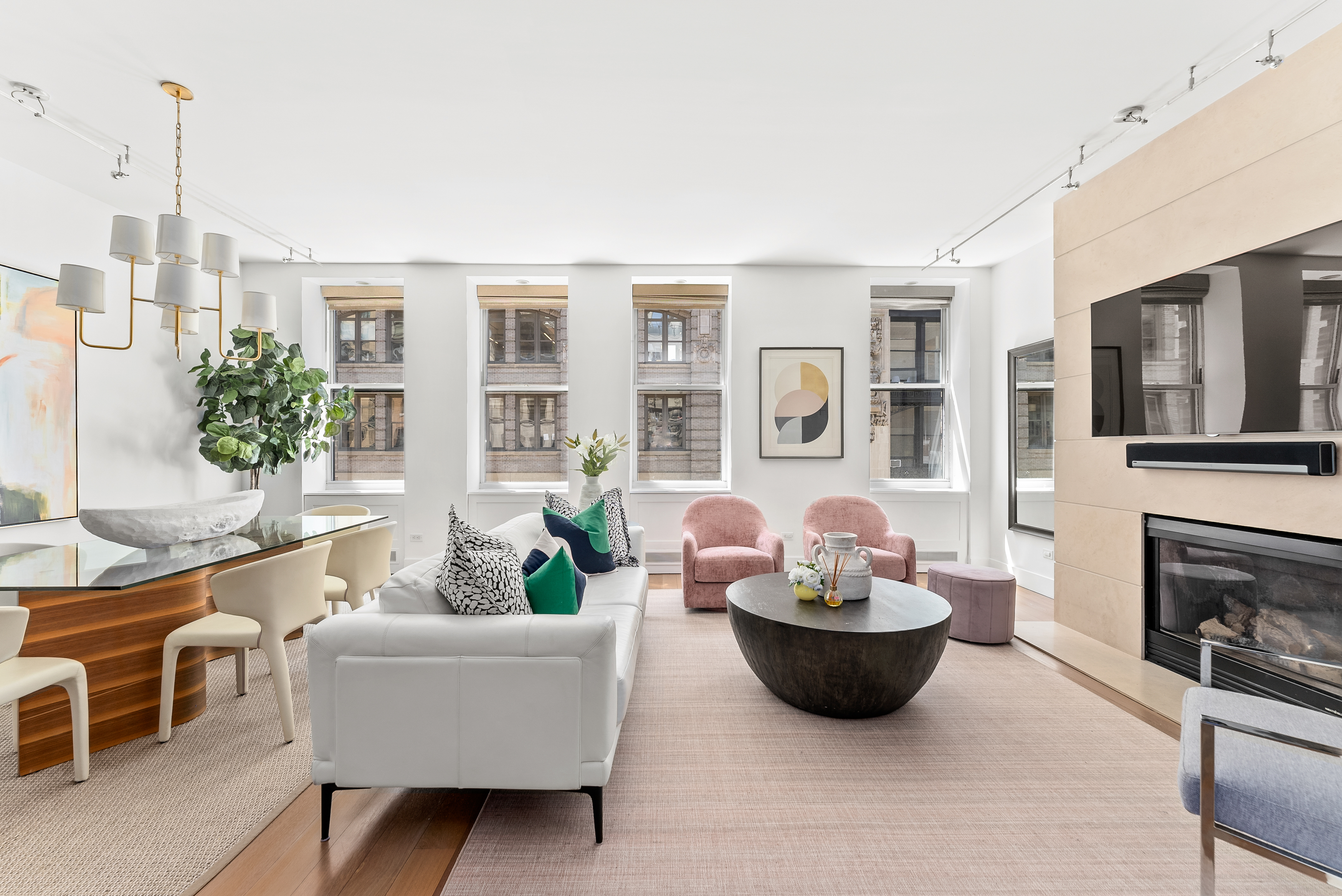 15 West 20th Street, Unit 9A Manhattan, NY 10011 - Photo 3 of 21 a living room with furniture and a potted plant