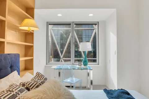 a view of a city with tall buildings