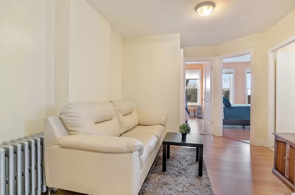 1688 Carroll Street, Unit 2 Brooklyn, NY 11213 - Photo 3 of 9 a living room with furniture and wooden floor