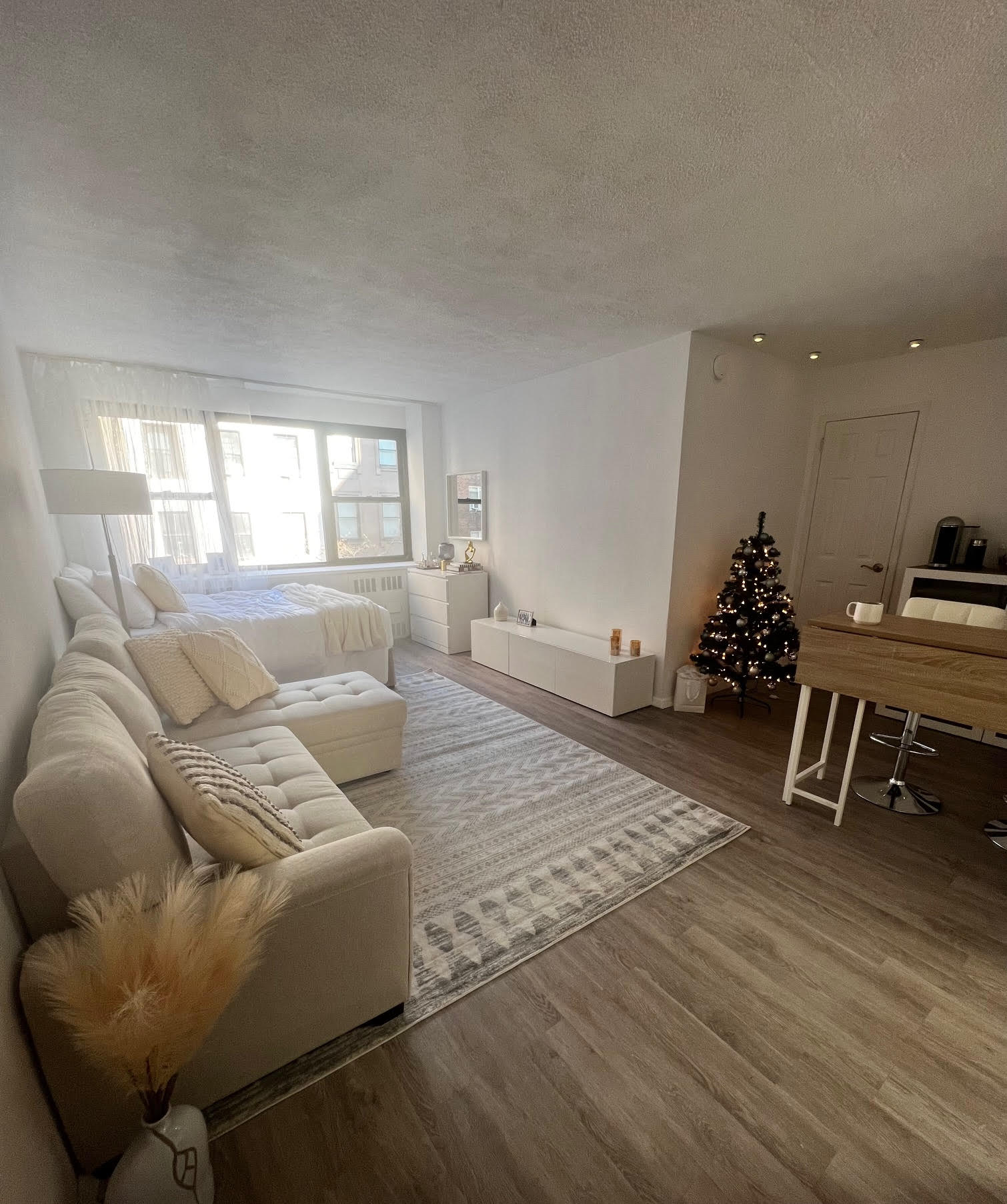 110 East 36th Street, Unit 5B Manhattan, NY 10016 - Photo 6 of 7 a living room with furniture