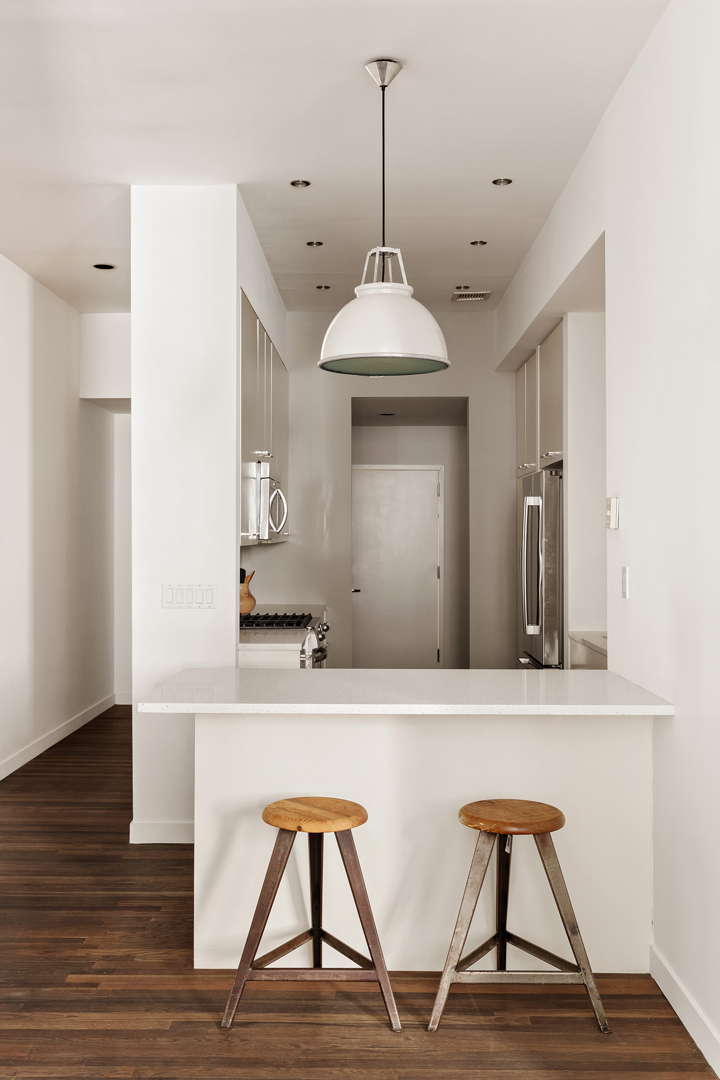 115 4th Avenue, Unit 2I Manhattan, NY 10003 - Photo 4 of 12 a view of hall way with furniture and wooden floor