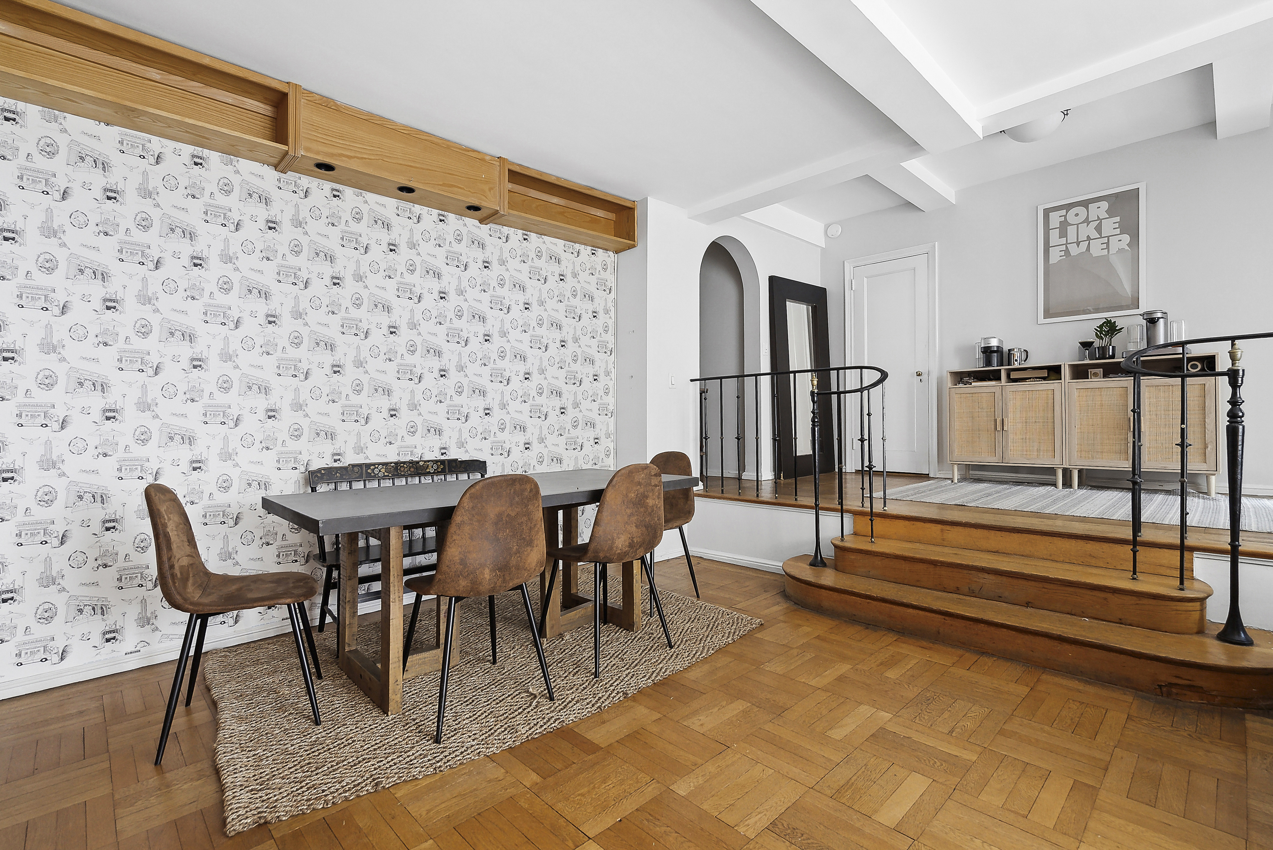 235 East 73rd Street, Unit 1D Manhattan, NY 10021 - Photo 4 of 13 a view of a chairs and table in the room