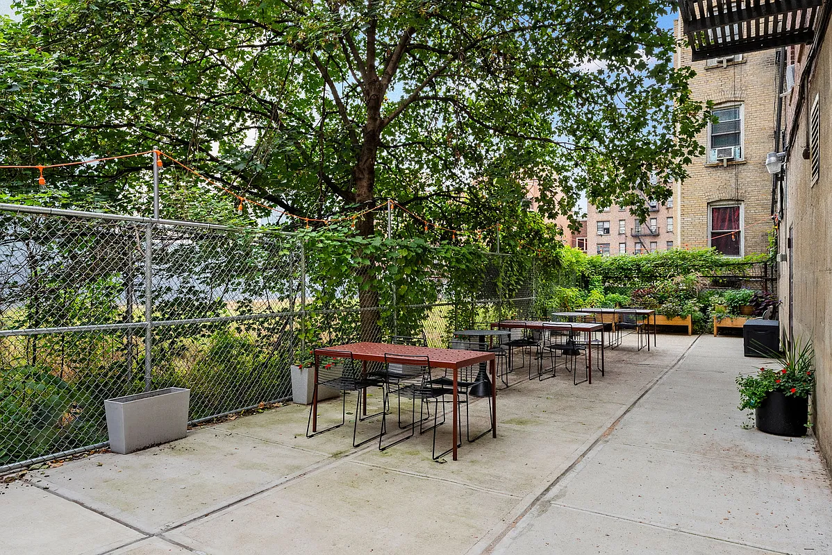 675 Academy Street, Unit 3A Manhattan, NY 10034 - Photo 11 of 12 a view of a tables and chairs in a patio
