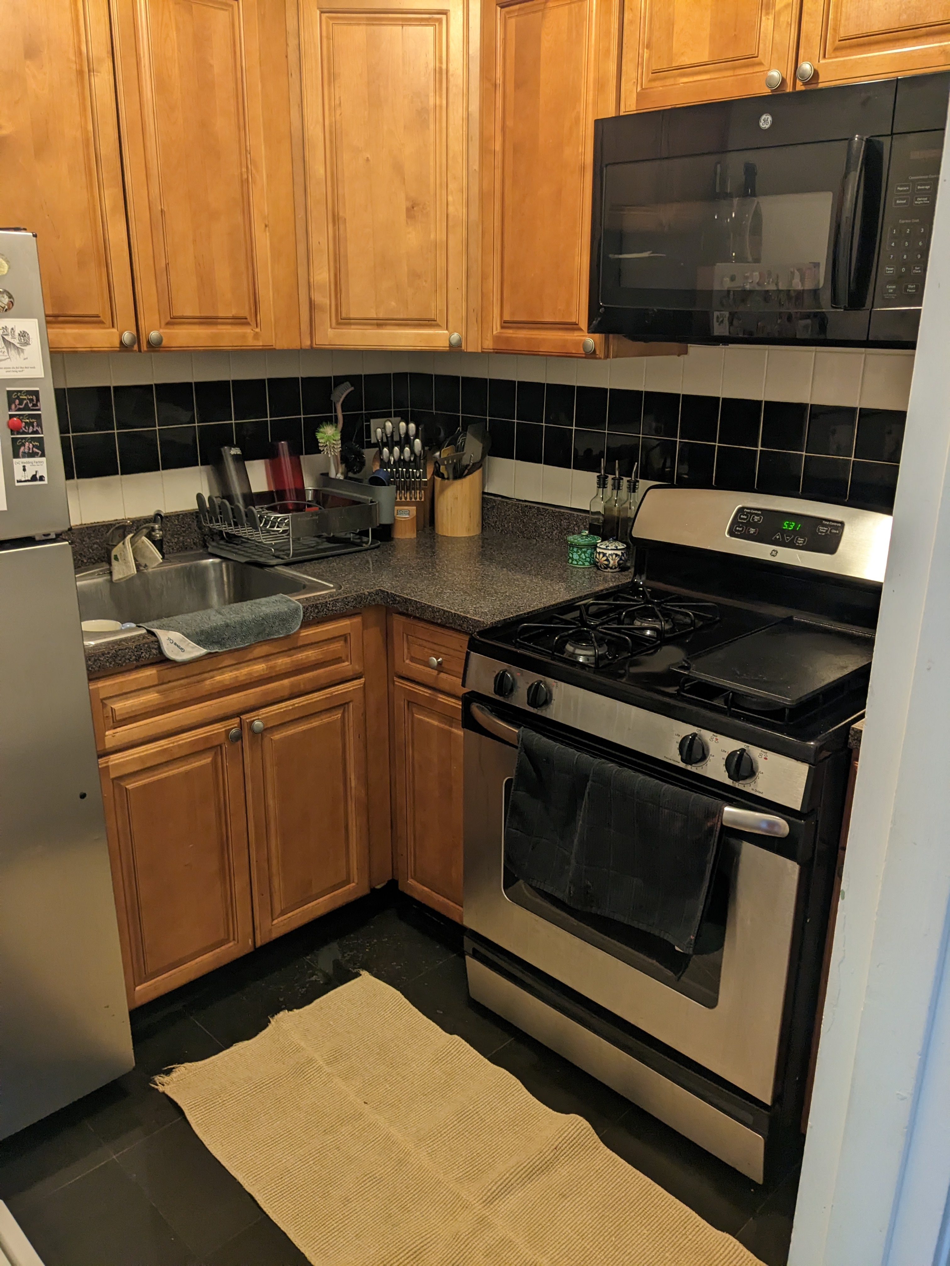 310 Lenox Road, Unit 3D Brooklyn, NY 11226 - Photo 7 of 9 a kitchen with granite countertop a stove and a sink