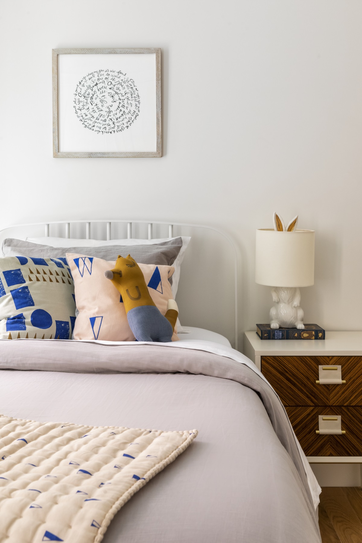 245 East 78th Street, Unit 5A Manhattan, NY 10075 - Photo 9 of 14 a bedroom with a bed and lamp