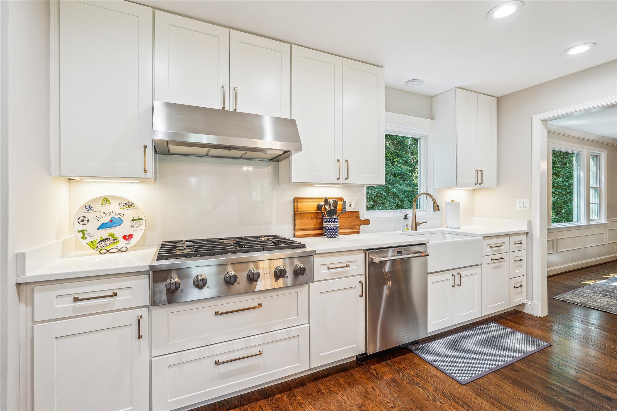 9904 Carter Road Bethesda, MD 20817 - Photo 15 of 41 a kitchen with cabinets and appliances