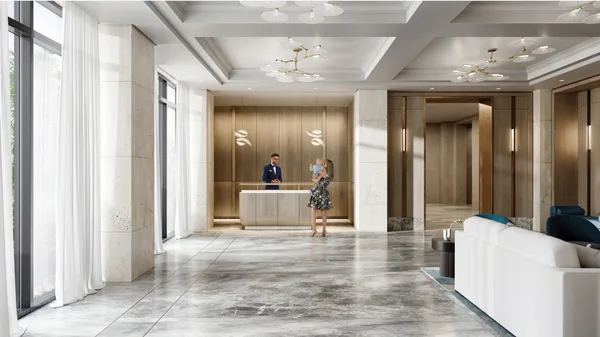 a view of a hallway with wooden floor and cabinet