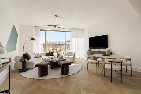a living room with fireplace furniture and a flat screen tv