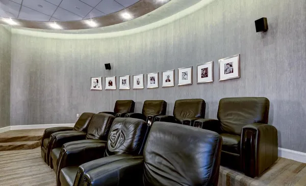 a view of a livingroom with furniture and windows
