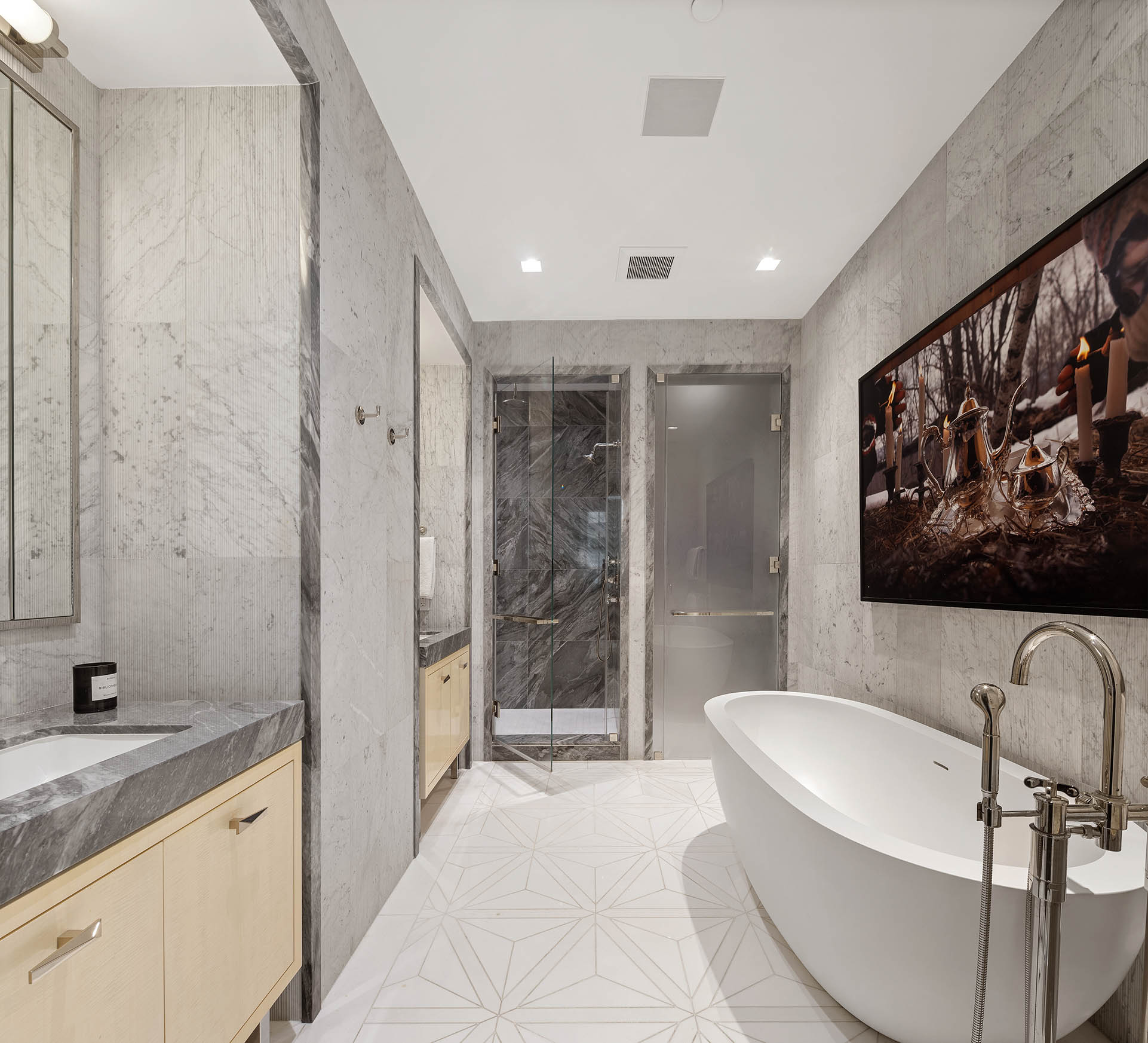 212 5th Avenue, Unit 9B Manhattan, NY 10010 - Photo 9 of 16 a bathroom with a bathtub and a sink