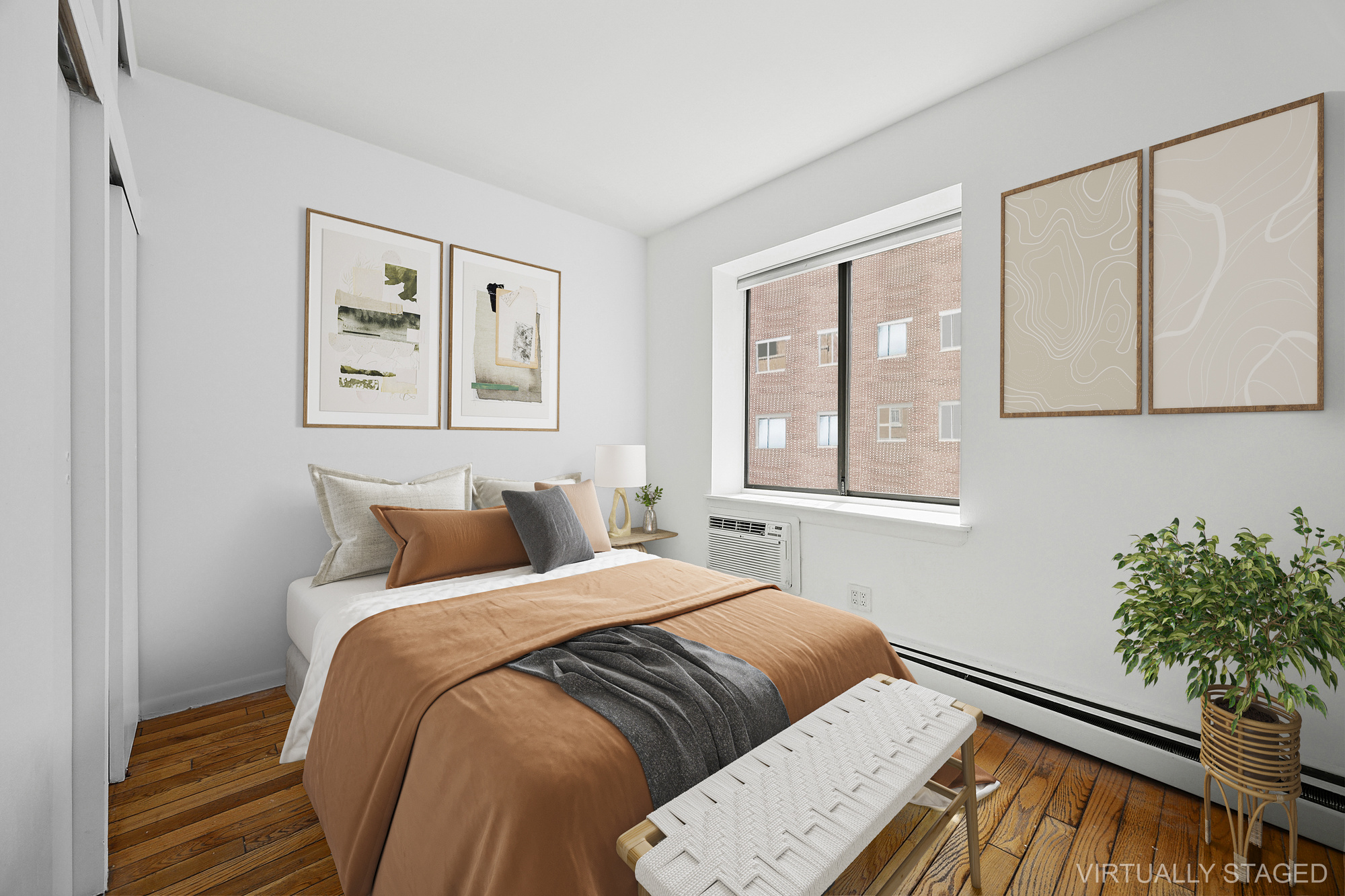 61 Lexington Avenue, Unit 4F Manhattan, NY 10010 - Photo 4 of 6 a bedroom with a bed and a window