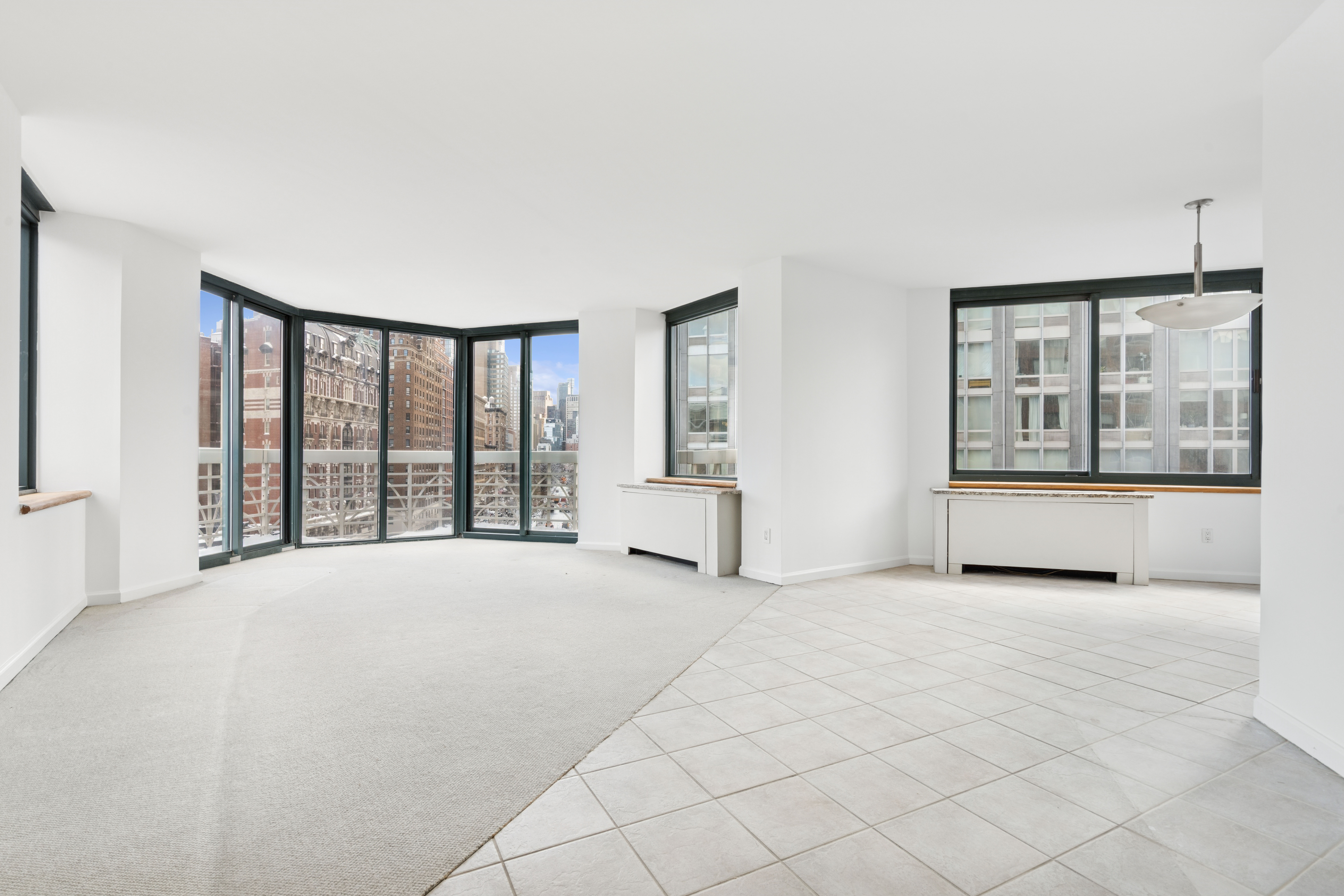 201 West 72nd Street, Unit 8A Manhattan, NY 10023 - Photo 2 of 15 a view of an empty room with a window