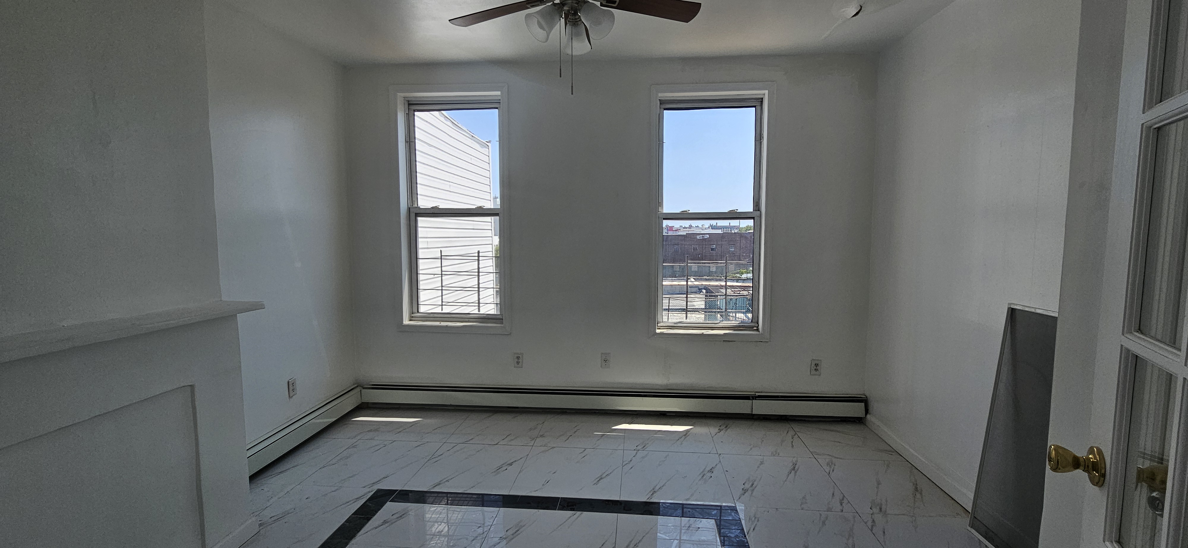 2610 Atlantic Avenue, Unit 3 Brooklyn, NY 11207 - Photo 2 of 5 a view of an empty room with a window