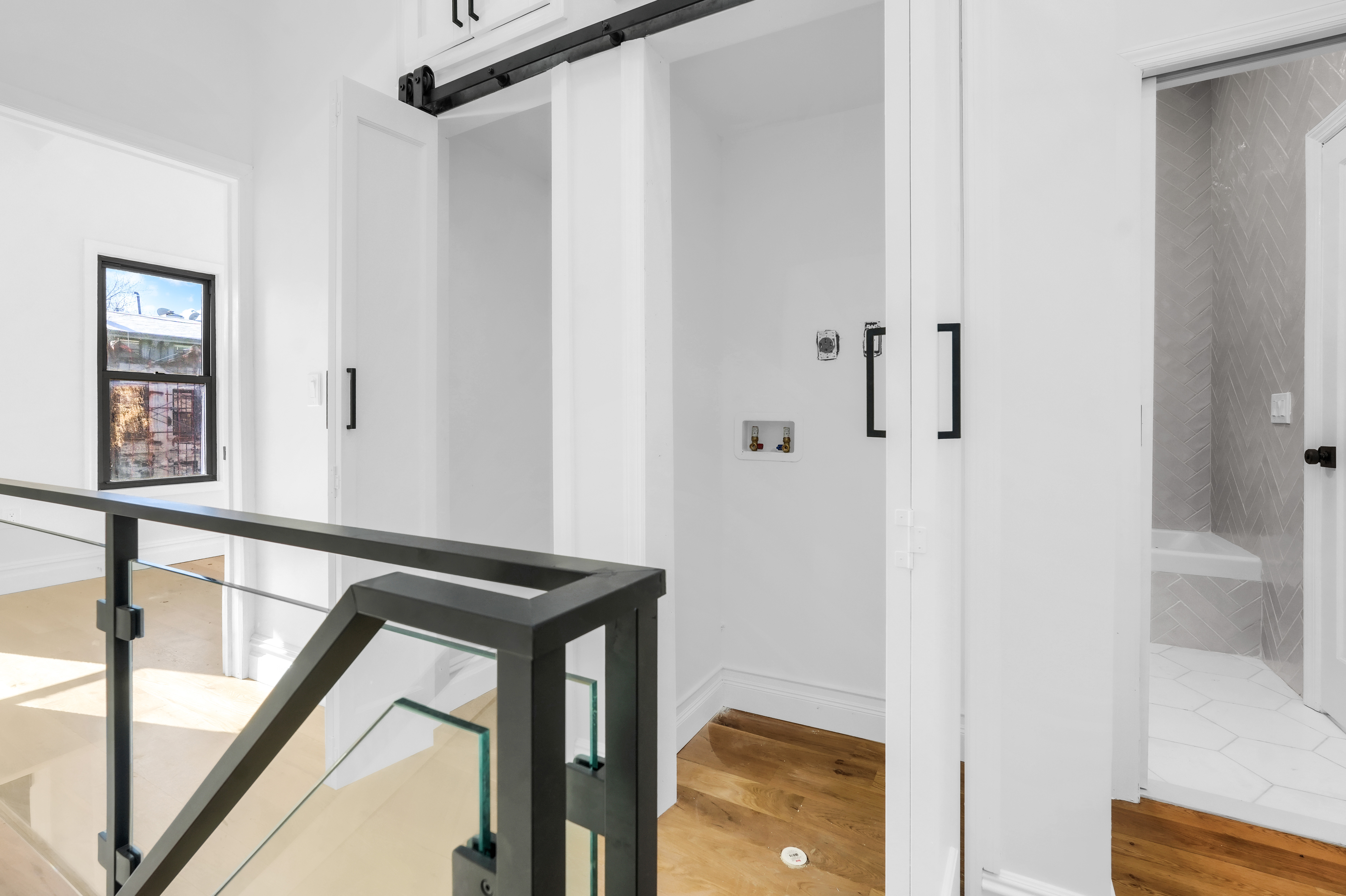 473 Monroe Street Brooklyn, NY 11221 - Photo 21 of 40 a view of a hallway with a door