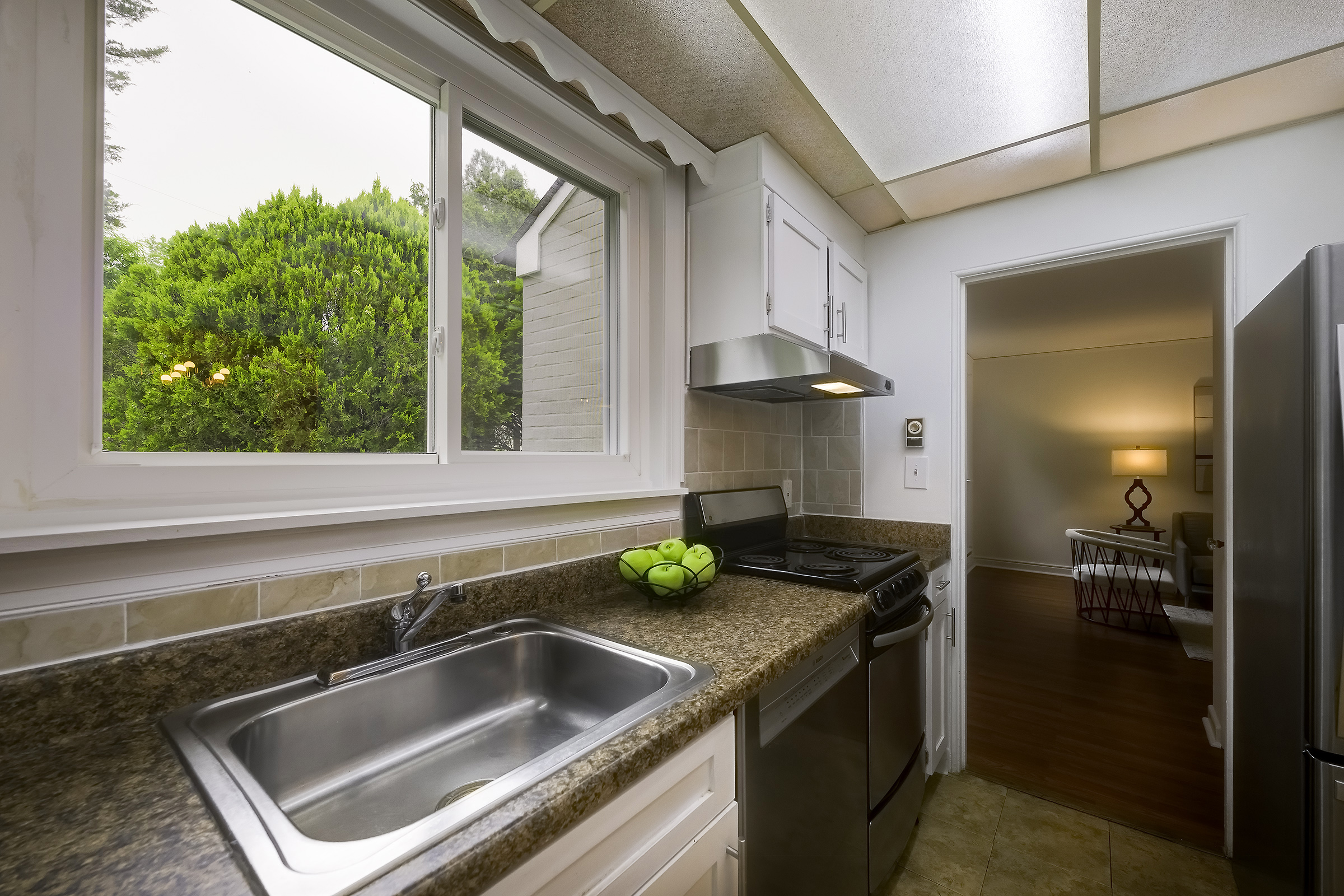 45 D Ridge Road Greenbelt, MD 20770 - Photo 16 of 35 a kitchen with a sink and a refrigerator