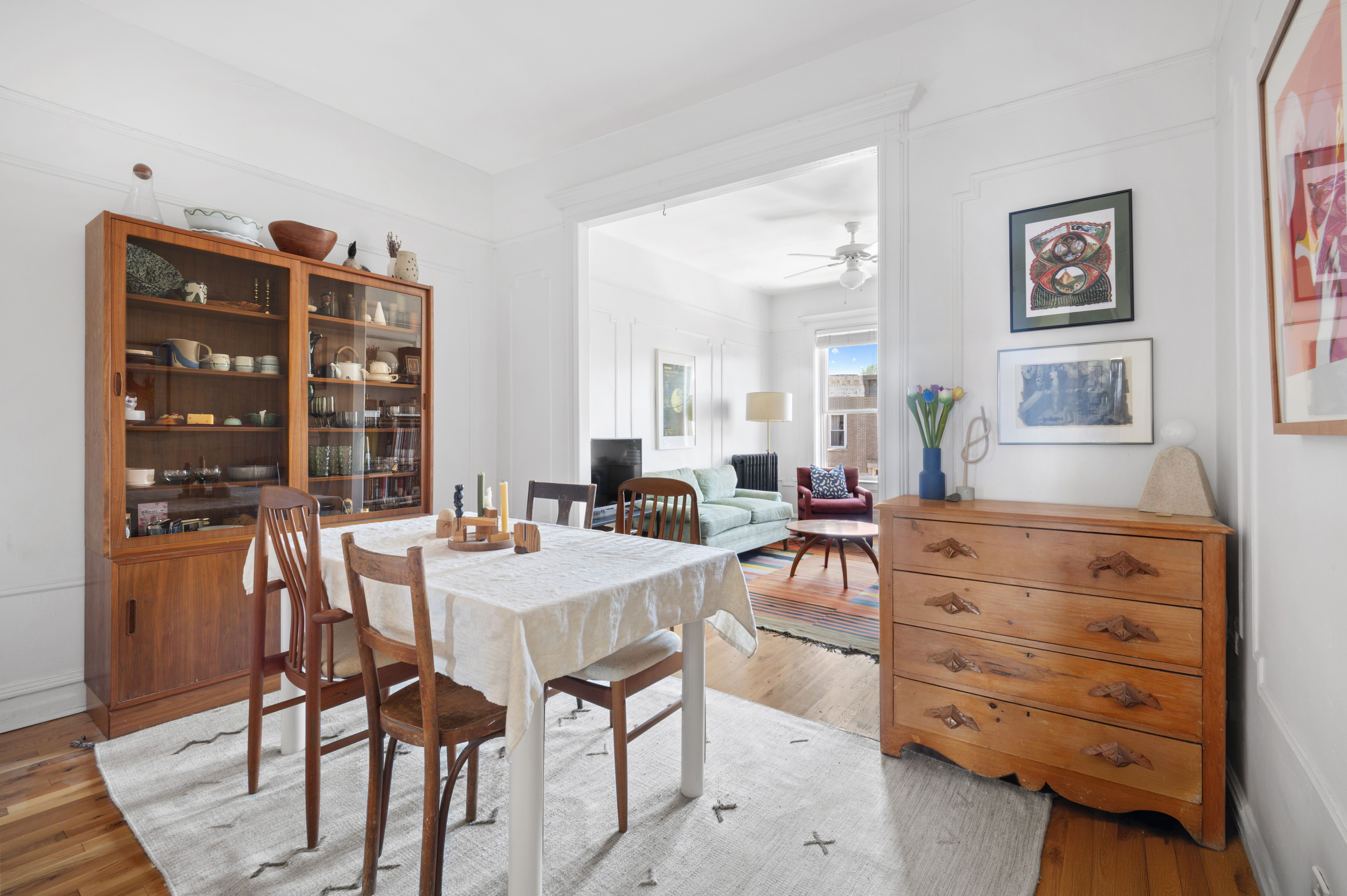 185 East 31st Street Brooklyn, NY 11226 - Photo 16 of 23 a dining room with furniture and wooden floor