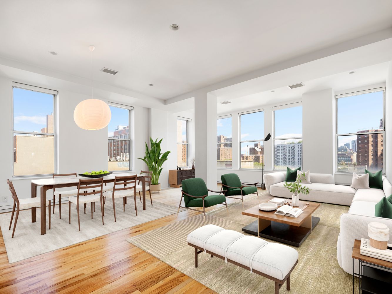 175 East Broadway, Unit 6D Manhattan, NY 10002 - Photo 1 of 18 a living room with furniture wooden floor and a large window
